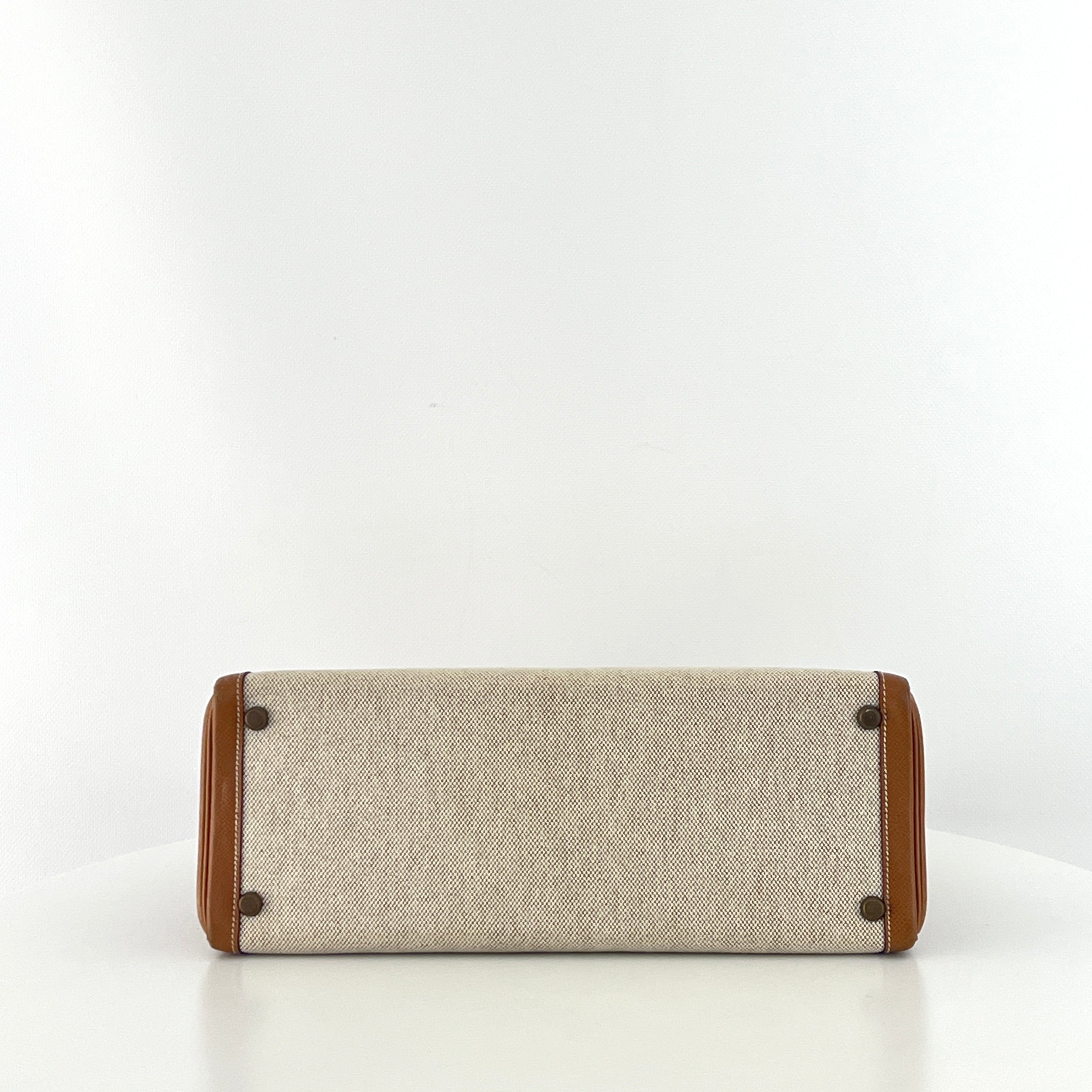 Sac à main HERMÈS Kelly 32 retourné en toile et cuir Gold Courchevel