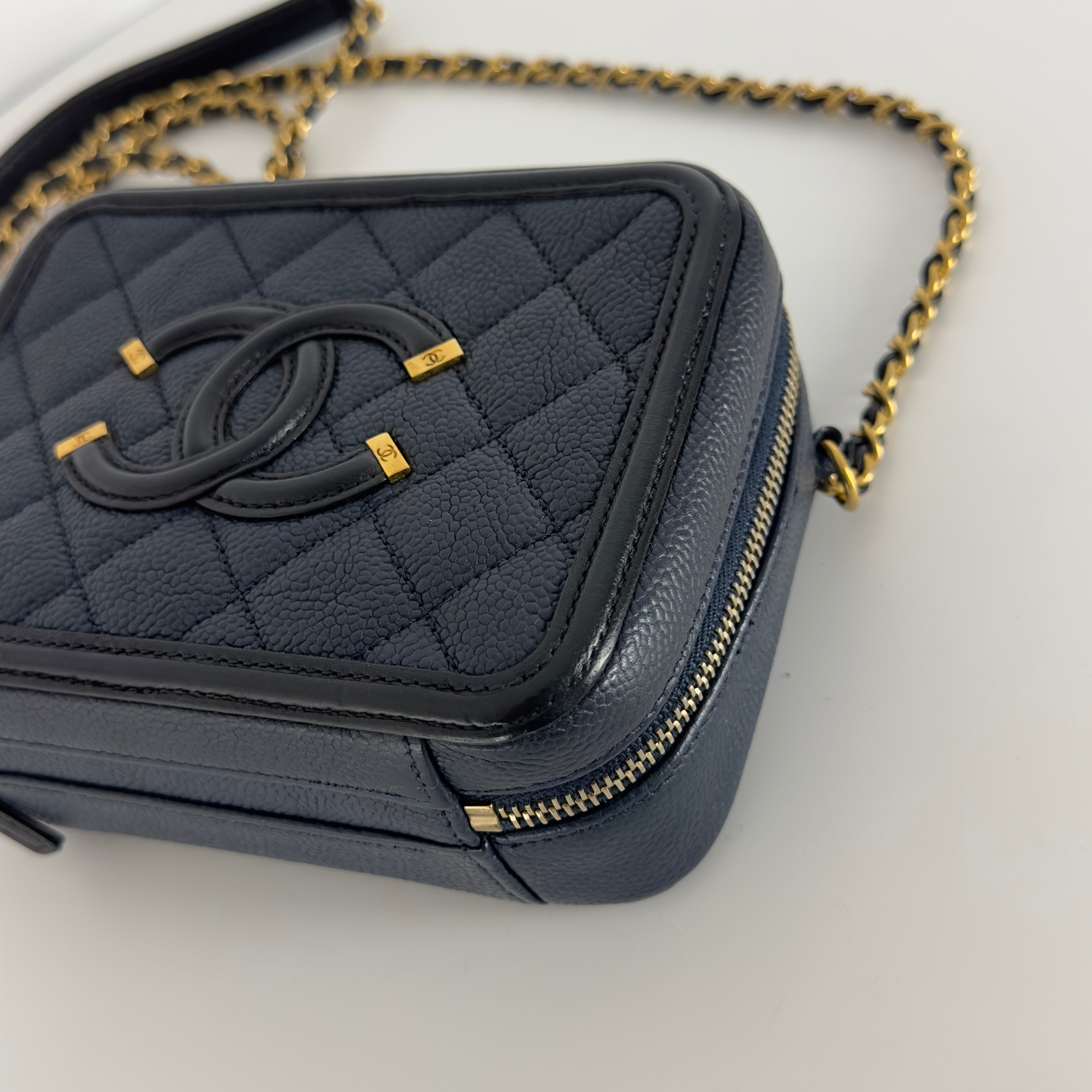 CHANEL Filigree Vanity Case handbag in midnight blue caviar leather