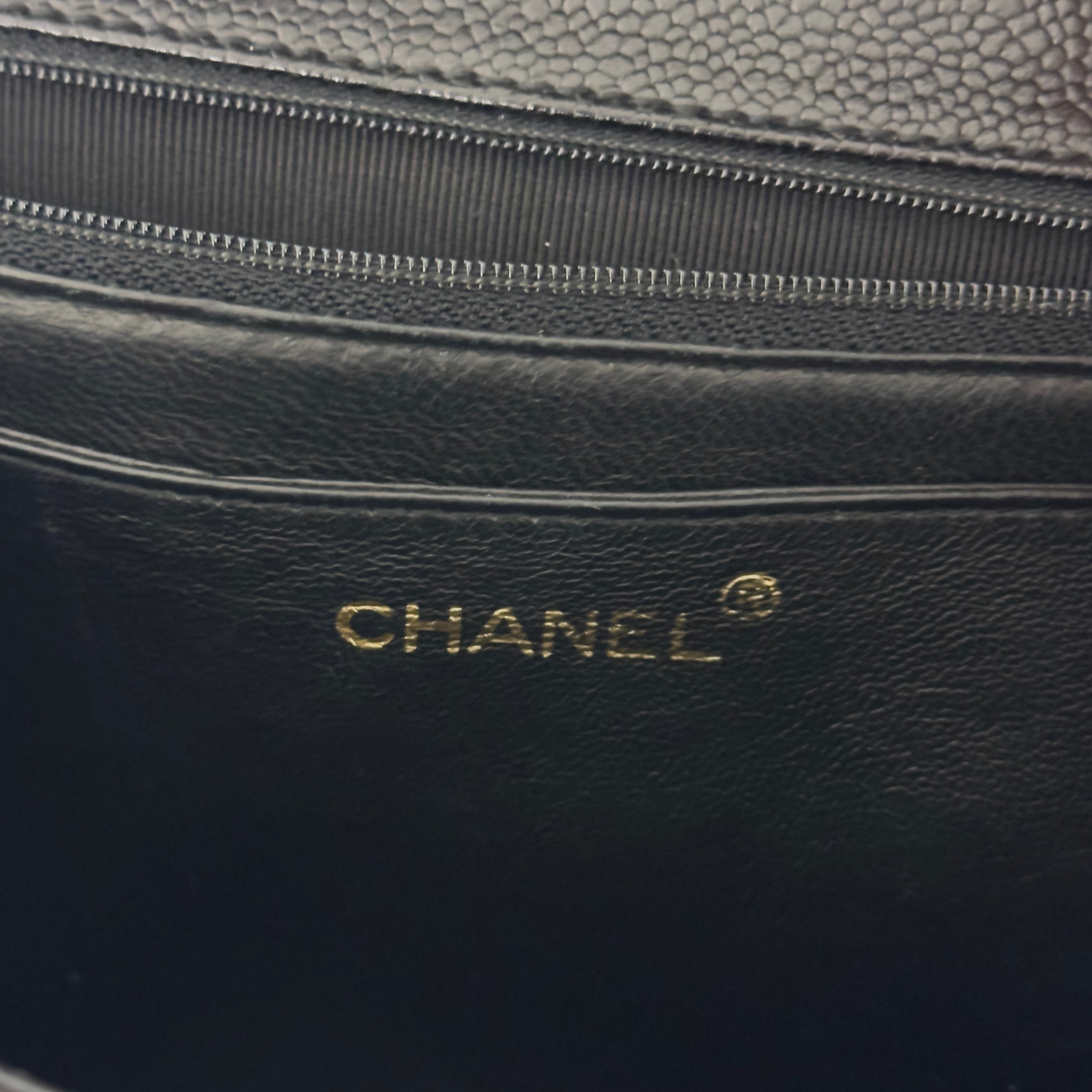 Sac à main CHANEL Top Handle cuir caviar noir