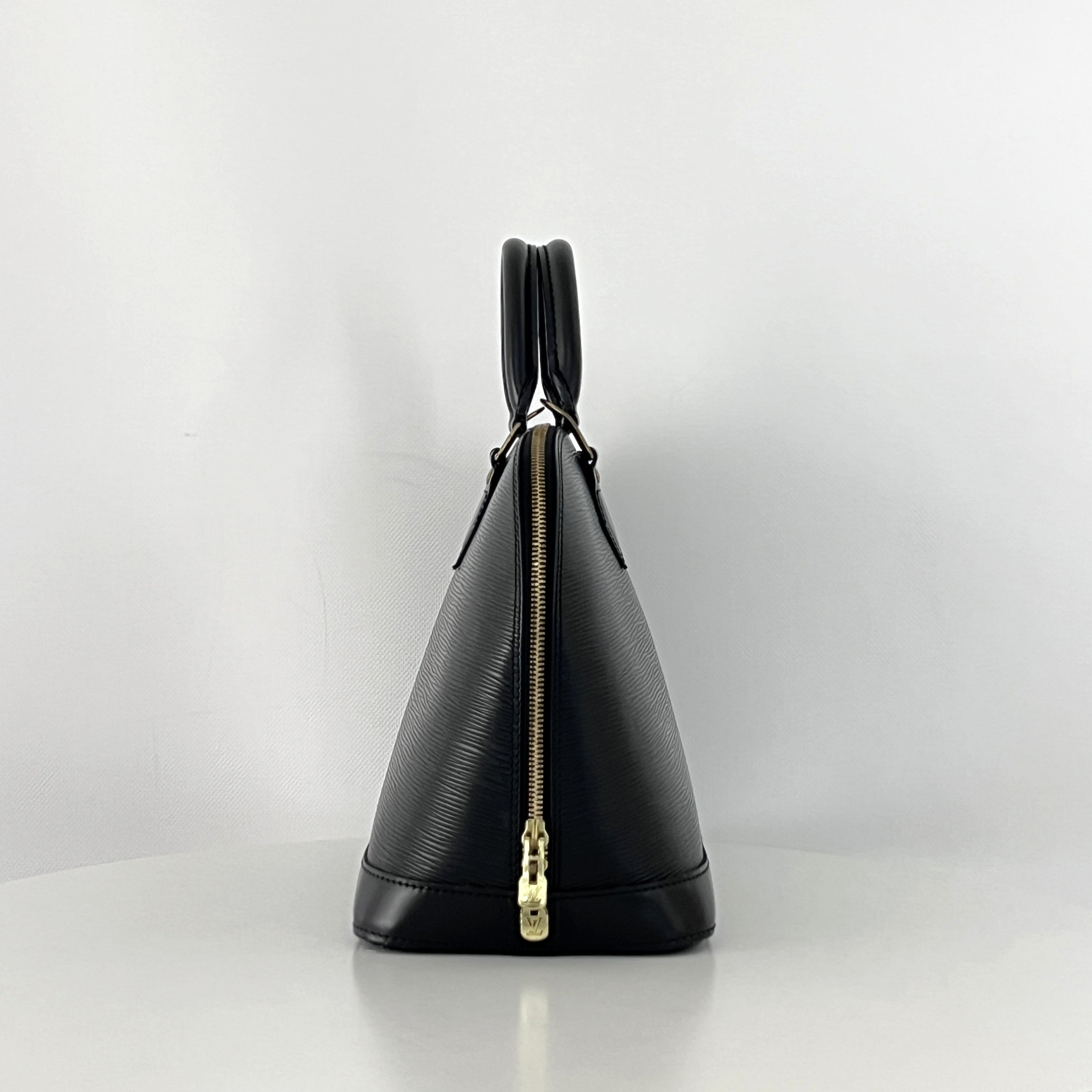 LOUIS VUITTON Alma PM handbag in black Epi leather