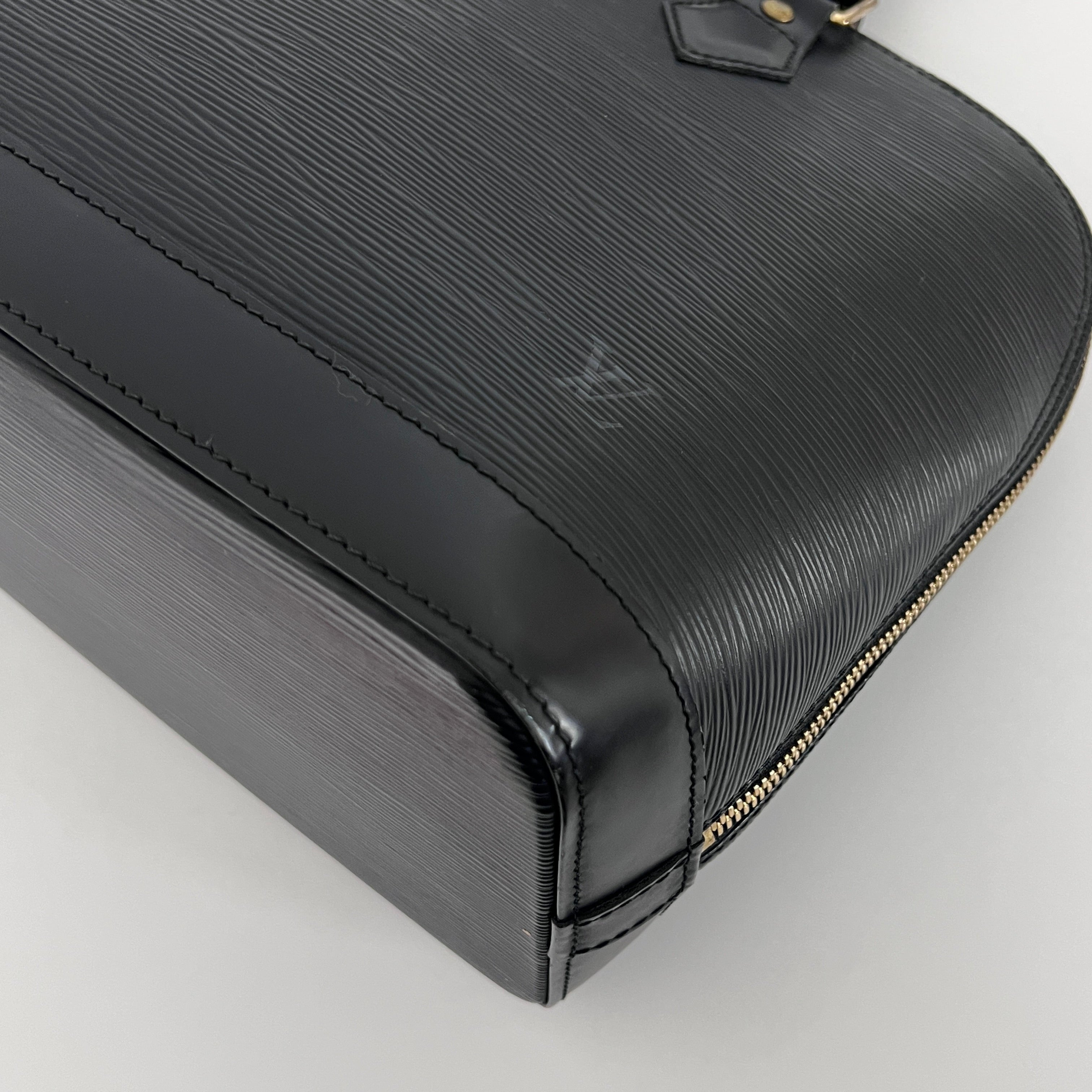 LOUIS VUITTON Alma PM handbag in black Epi leather