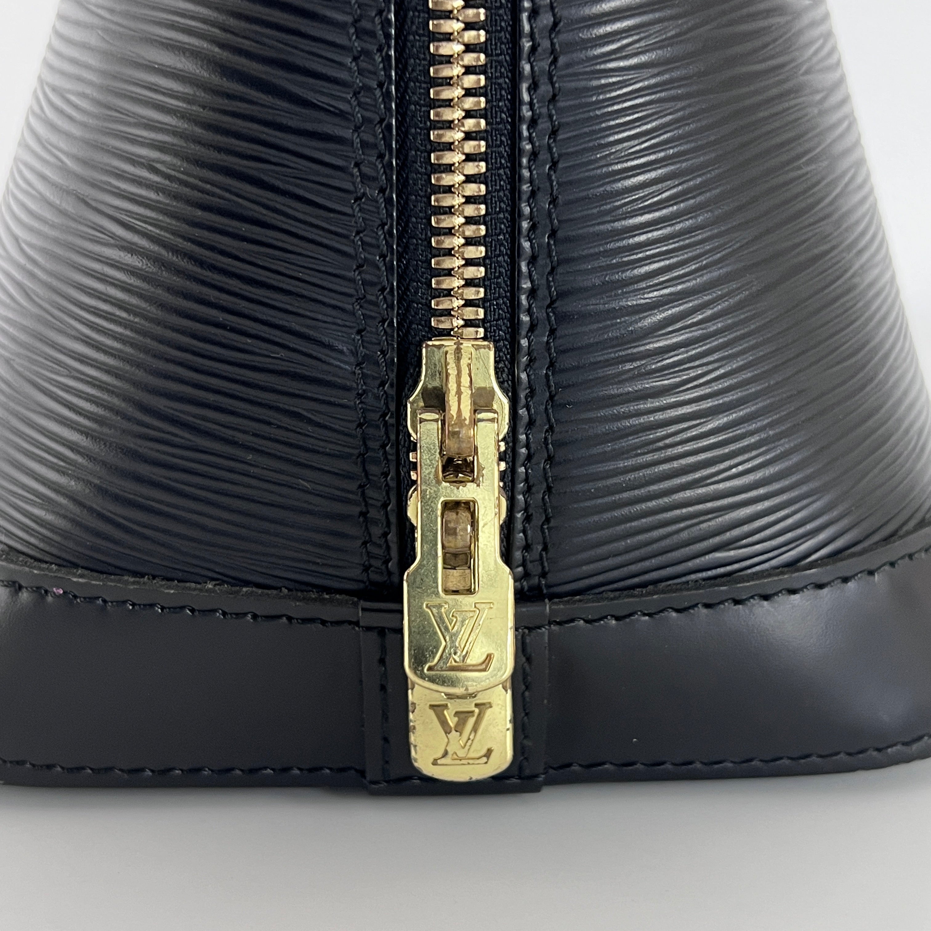 LOUIS VUITTON Alma PM handbag in black Epi leather