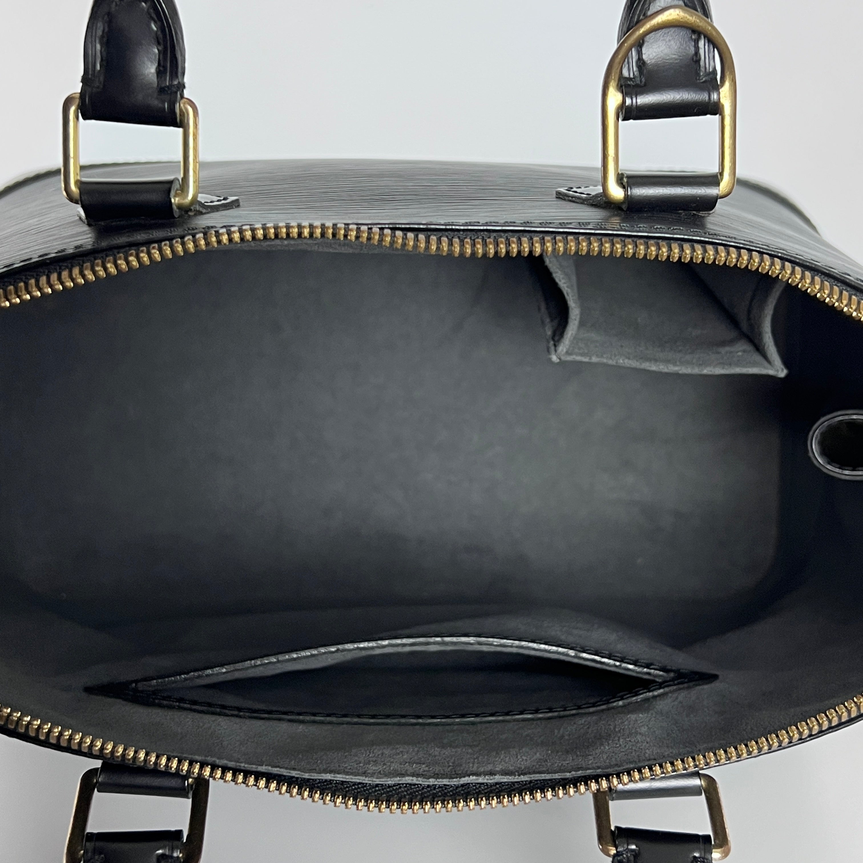 LOUIS VUITTON Alma PM handbag in black Epi leather