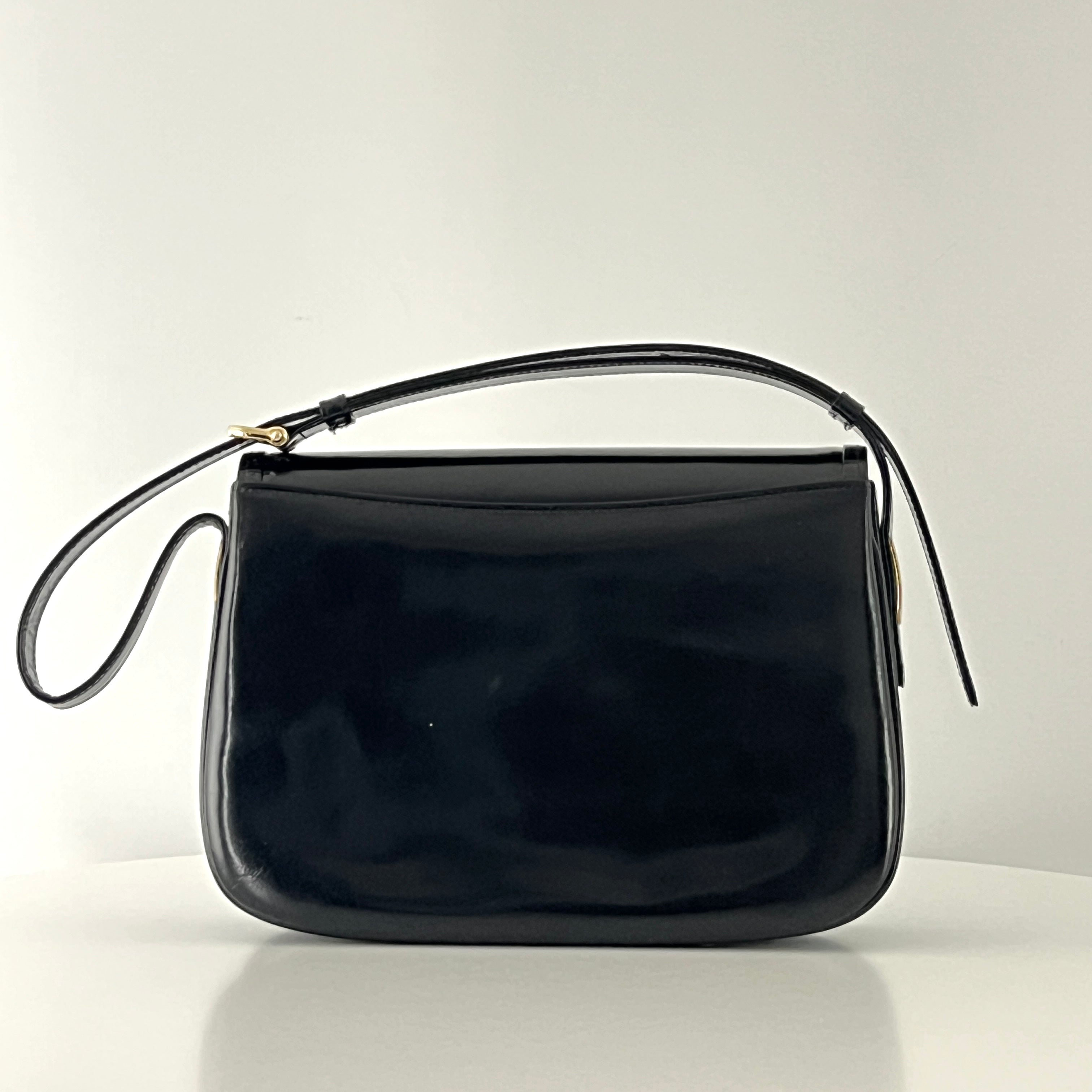 Sac à main CELINE Triomphe cuir noir