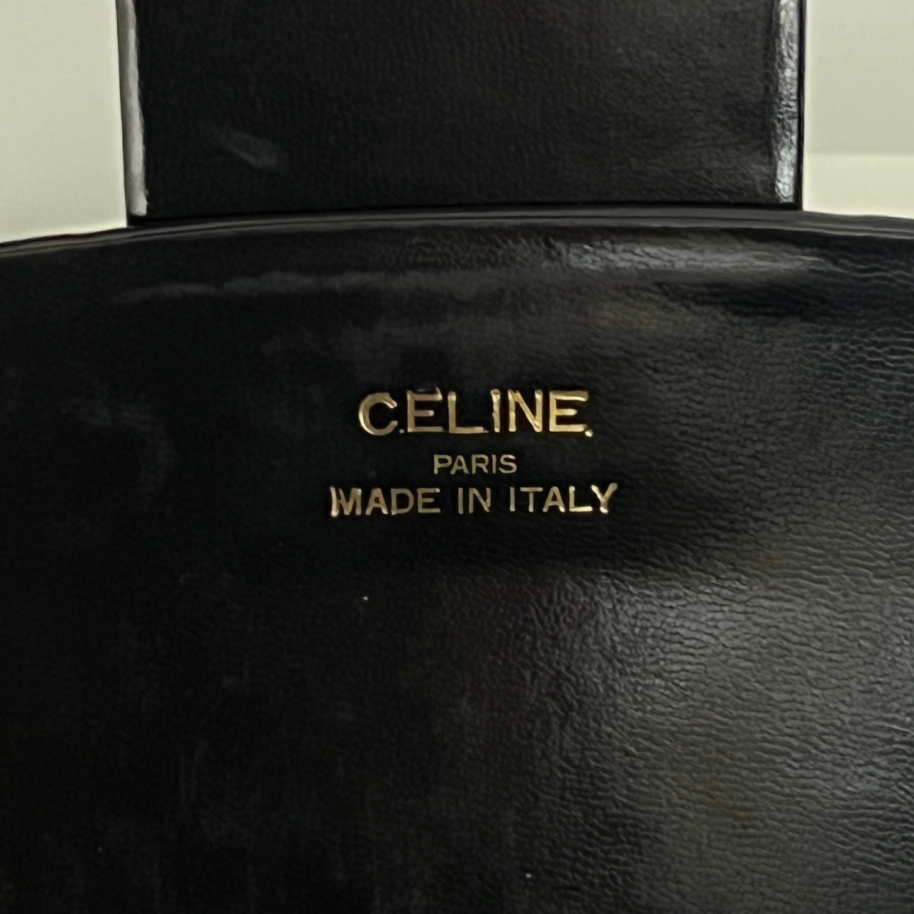 Sac à main CELINE Triomphe cuir noir