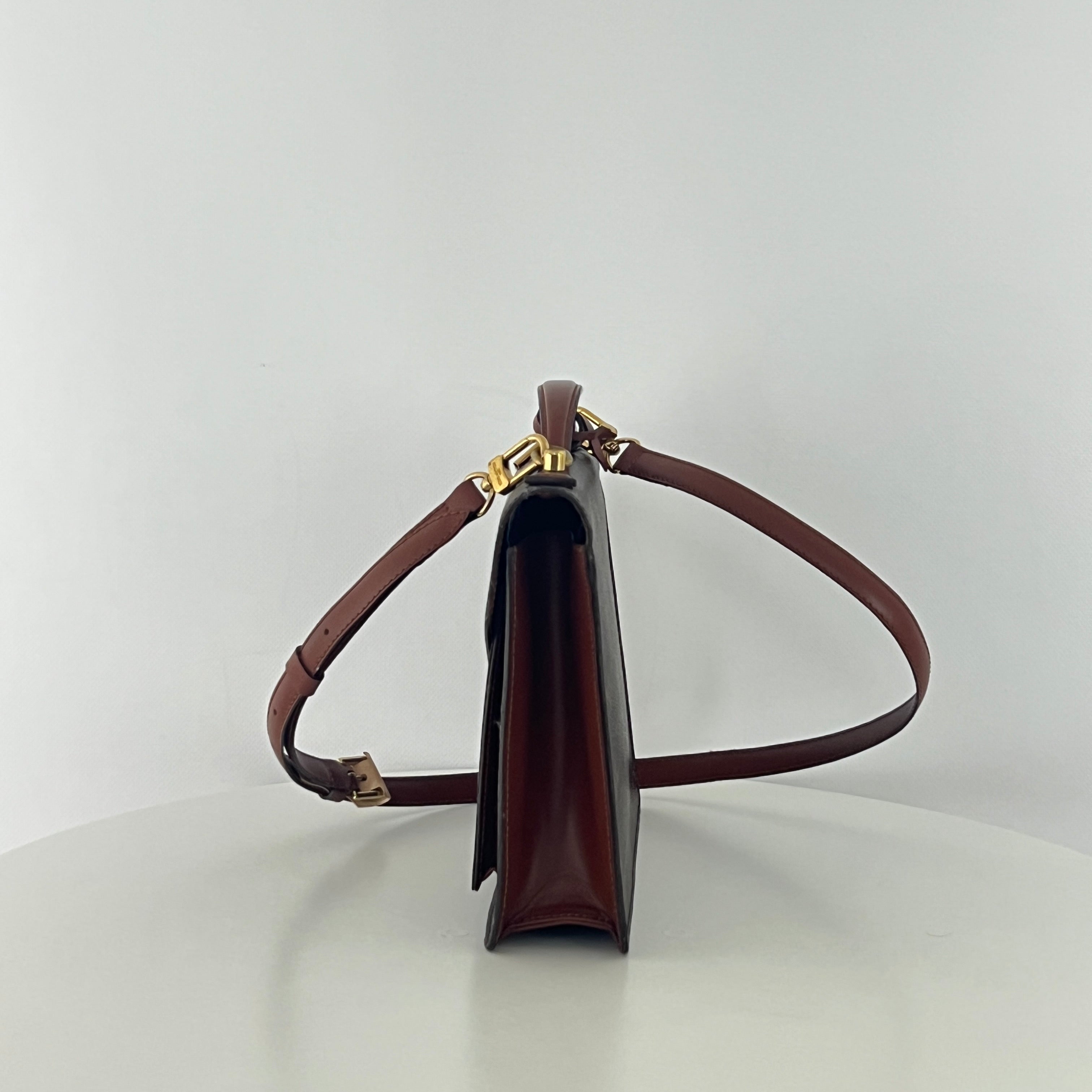 Sac à main LOUIS VUITTON Monceau toile et cuir marron