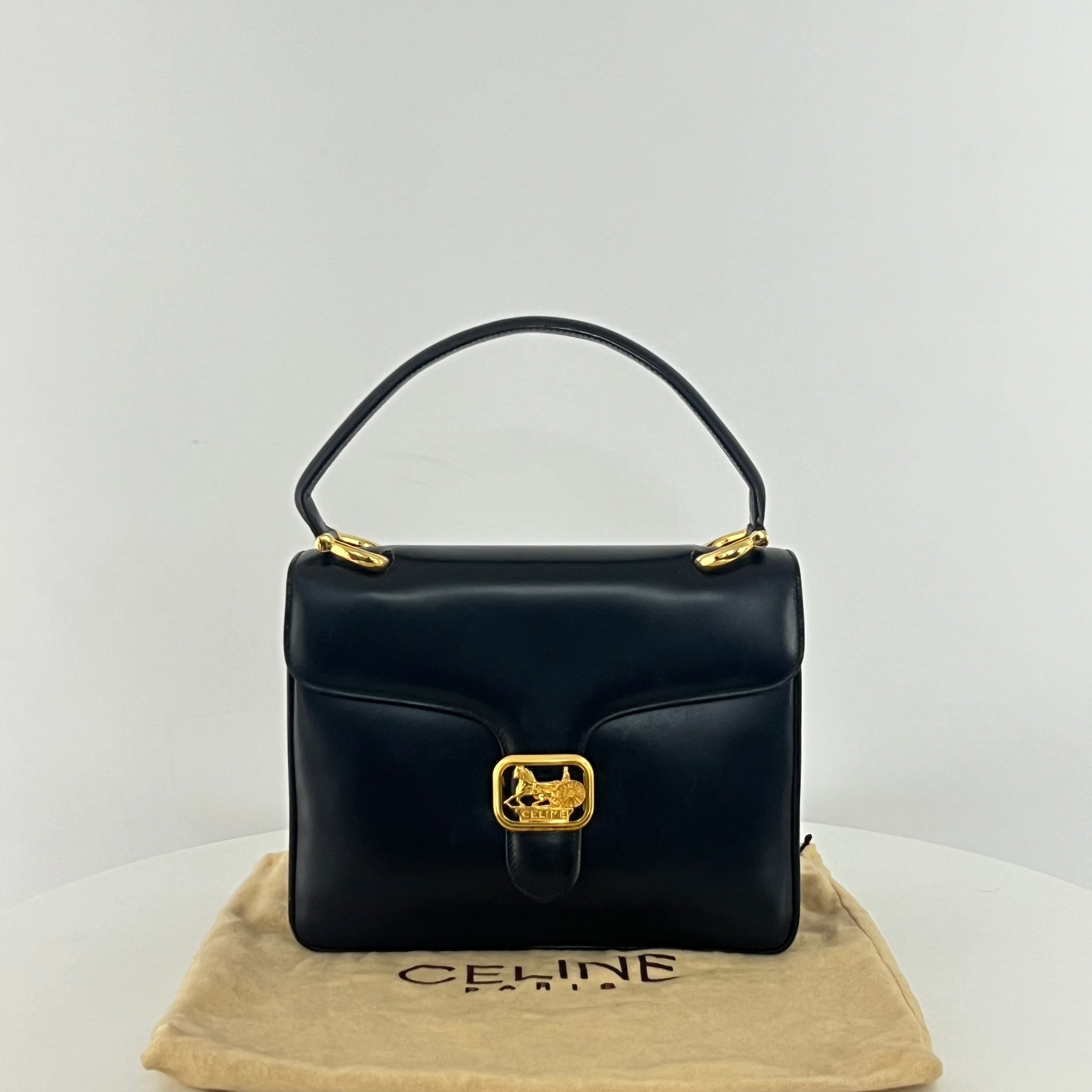 Sac à main CELINE Triomphe cuir noir