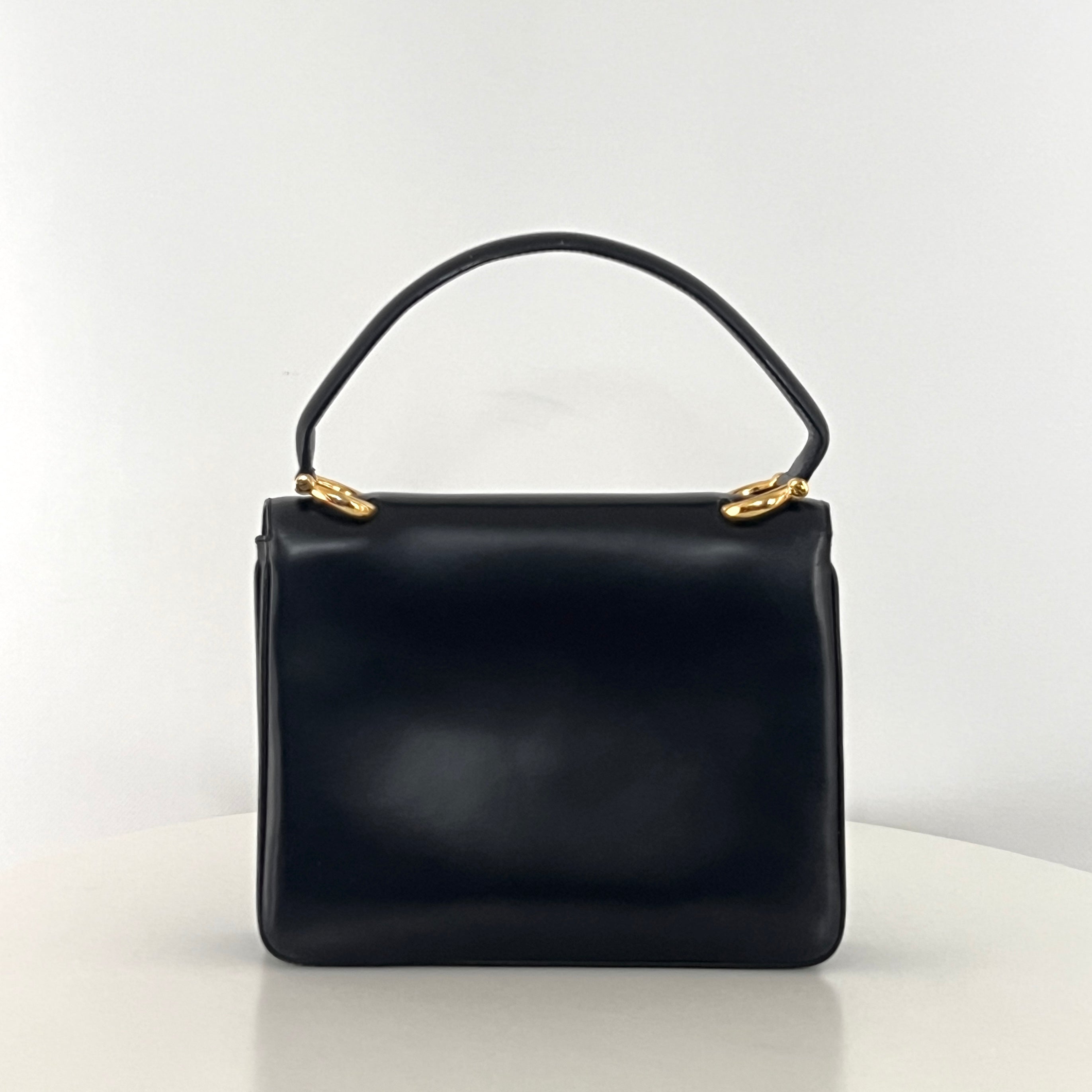 Sac à main CELINE Triomphe cuir noir