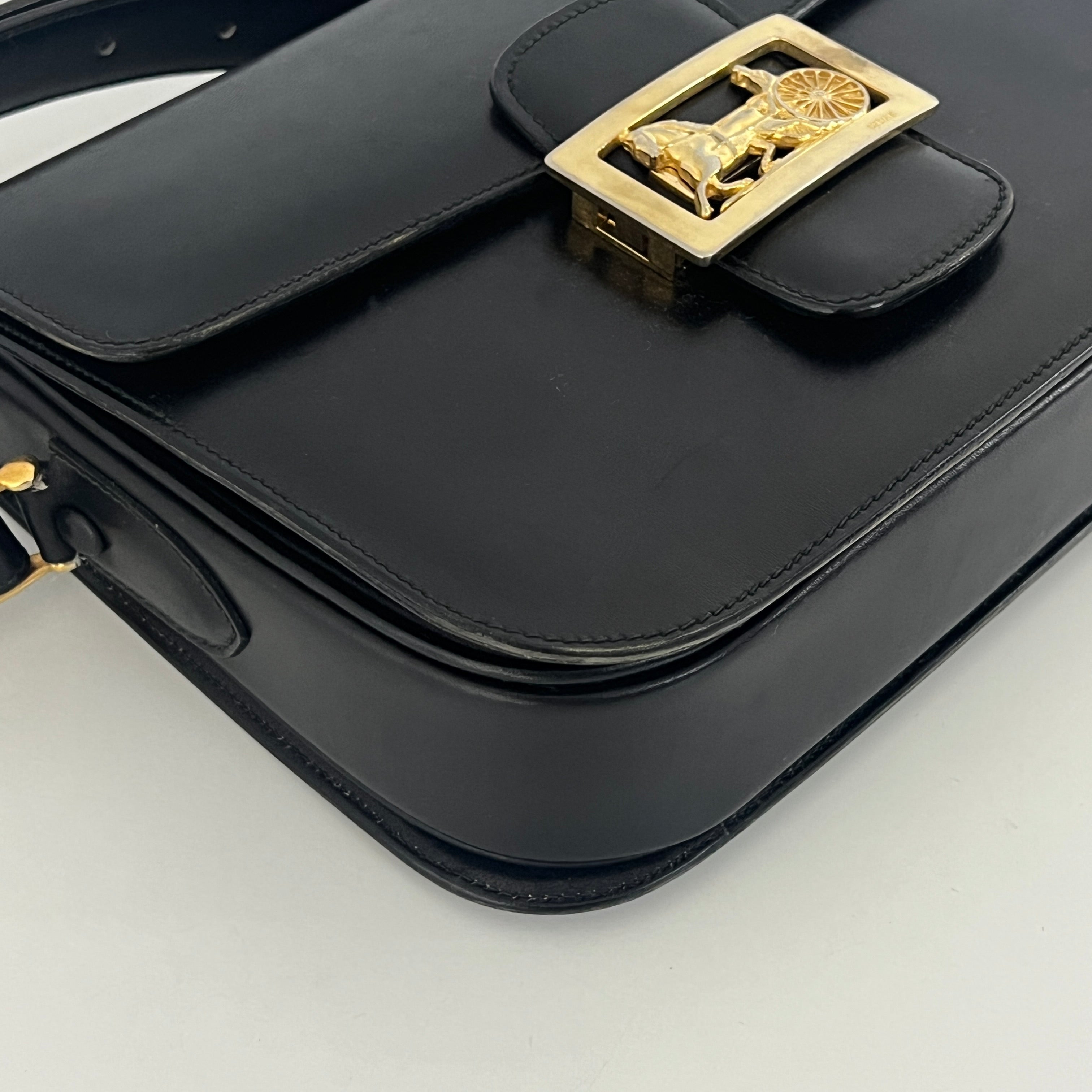 Sac à main CELINE Triomphe cuir noir