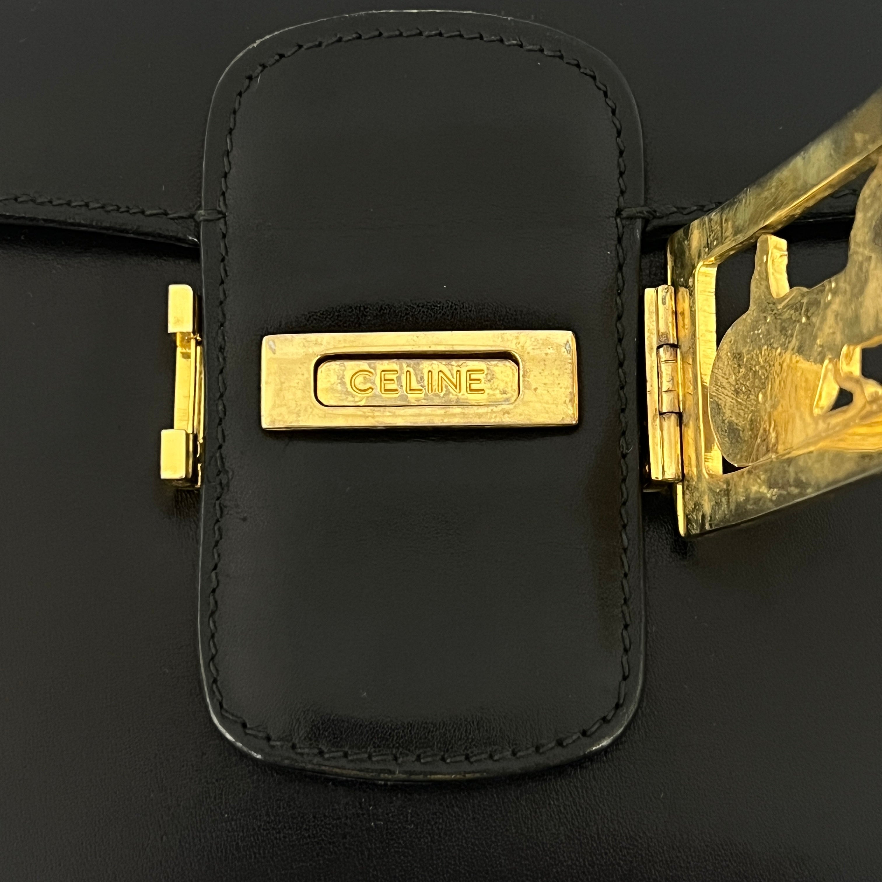 Sac à main CELINE Triomphe cuir noir