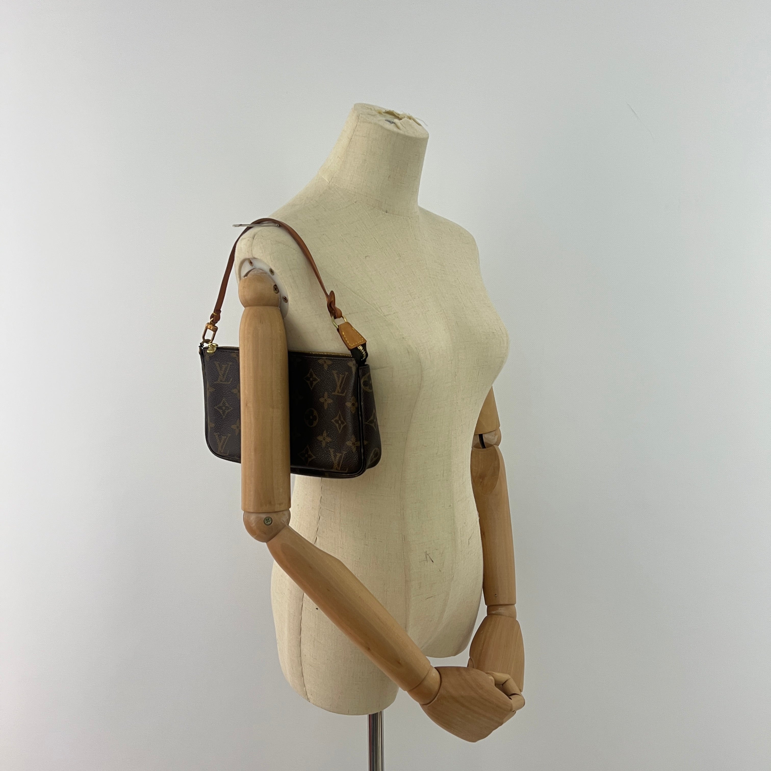 LOUIS VUITTON Pochette Accessoires handbag in brown canvas and leather