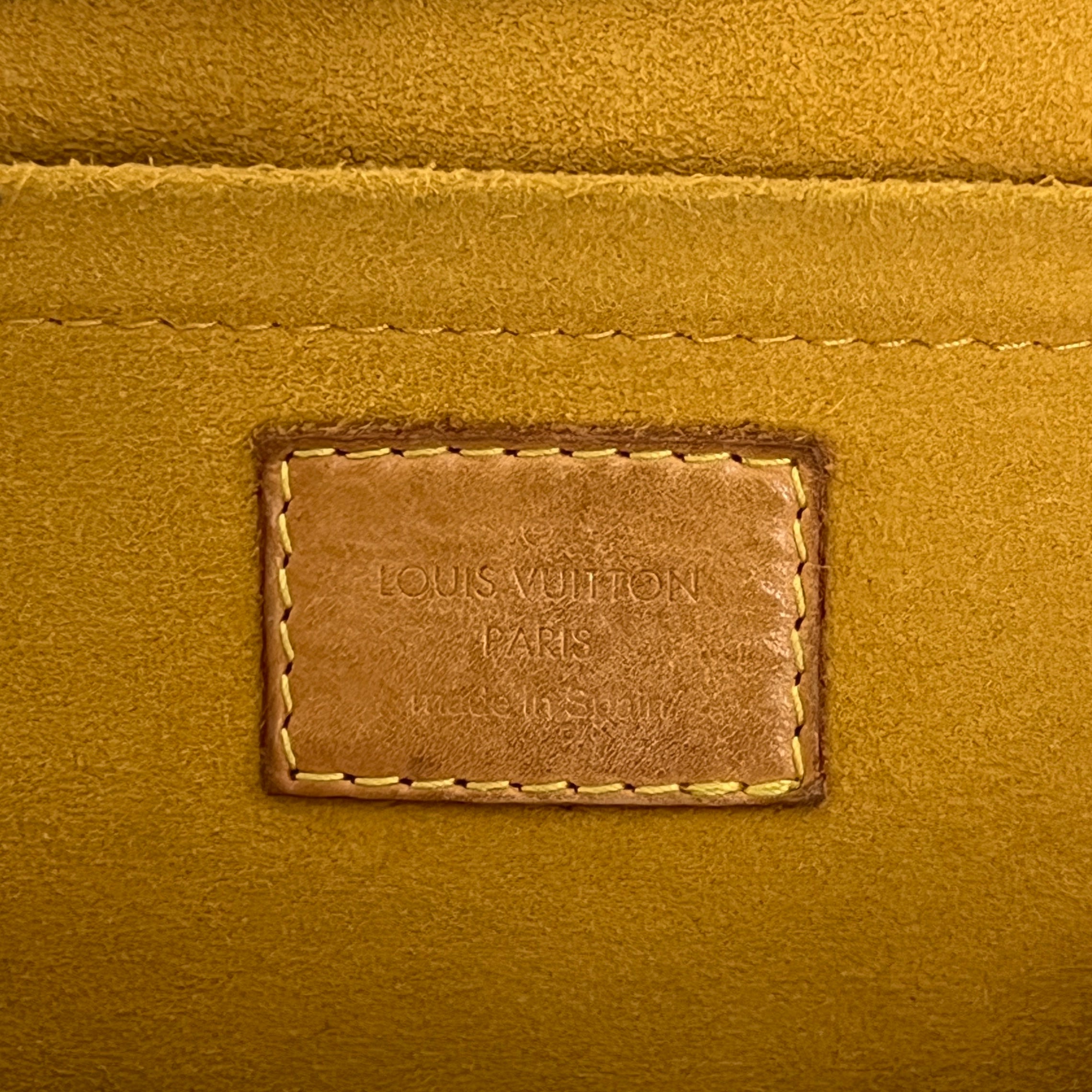 LOUIS VUITTON Pleaty Denim handbag in blue canvas and leather