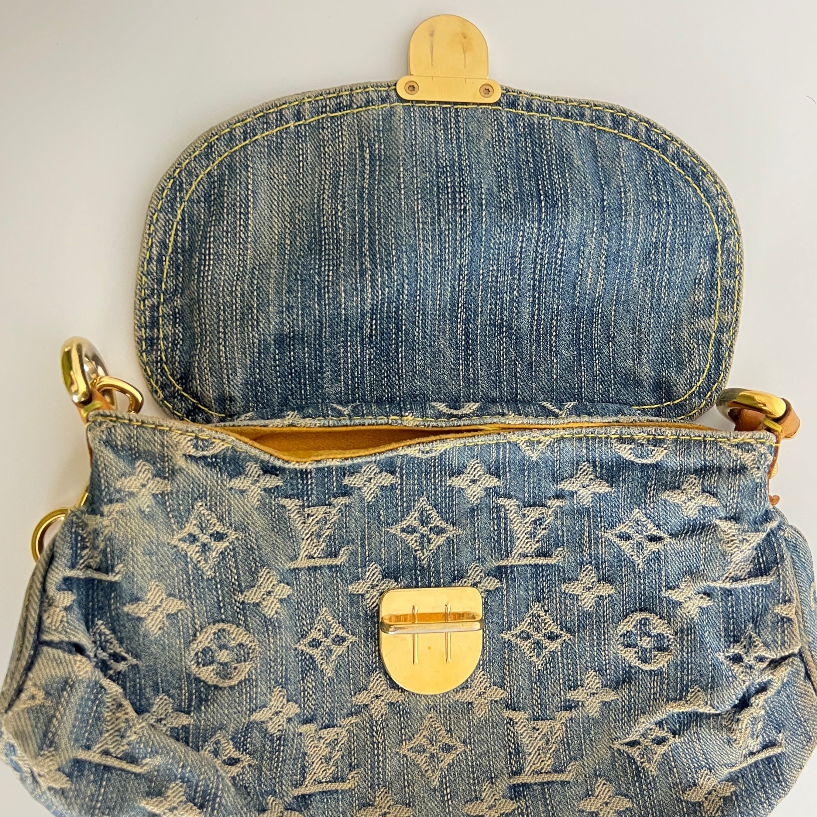 Sac à main LOUIS VUITTON Pleaty Denim toile et cuir bleu