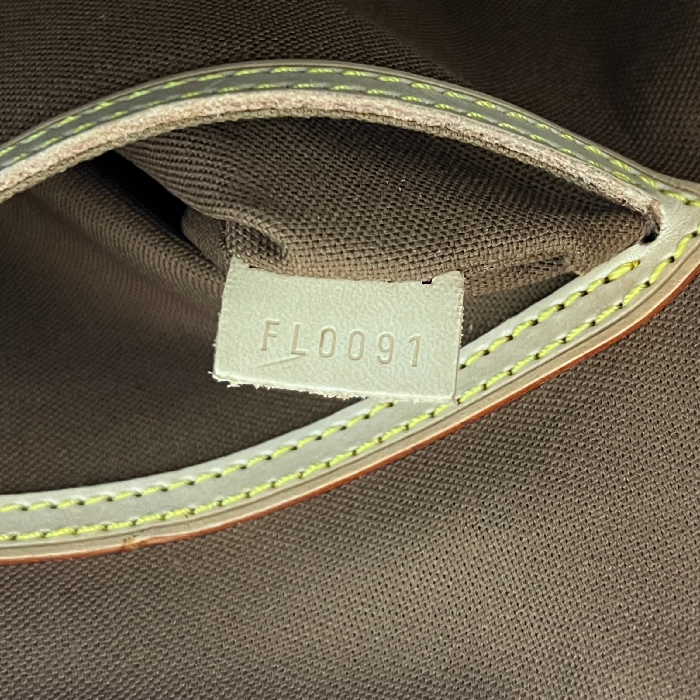 LOUIS VUITTON Alma PM handbag in brown canvas and leather