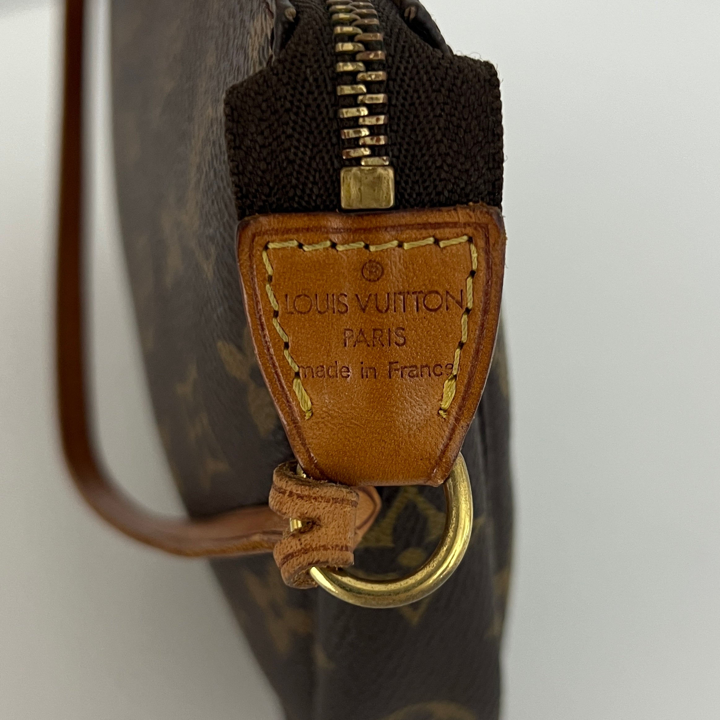 LOUIS VUITTON Pochette Accessoires handbag in brown canvas and leather