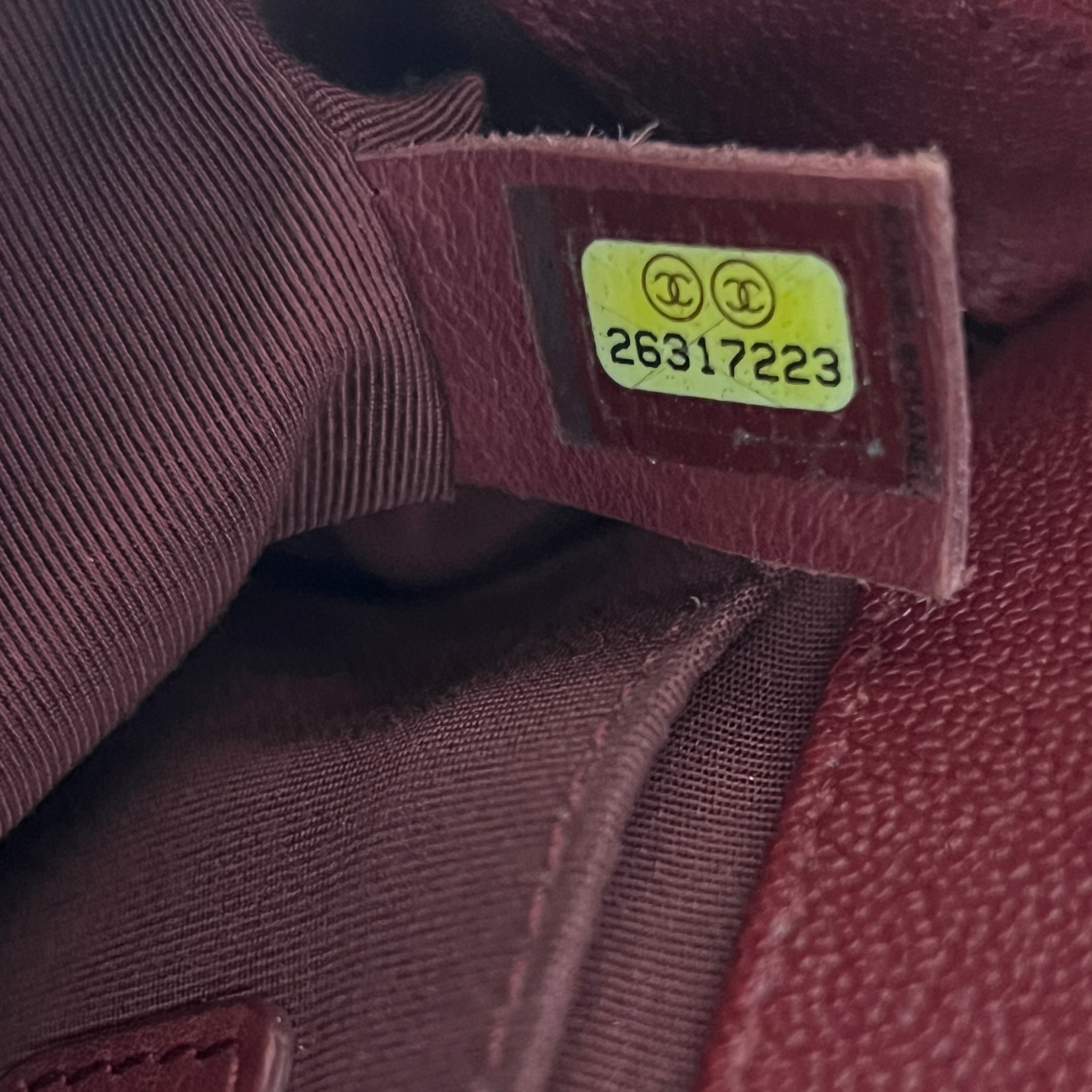 CHANEL Boy Chevron handbag in red caviar leather