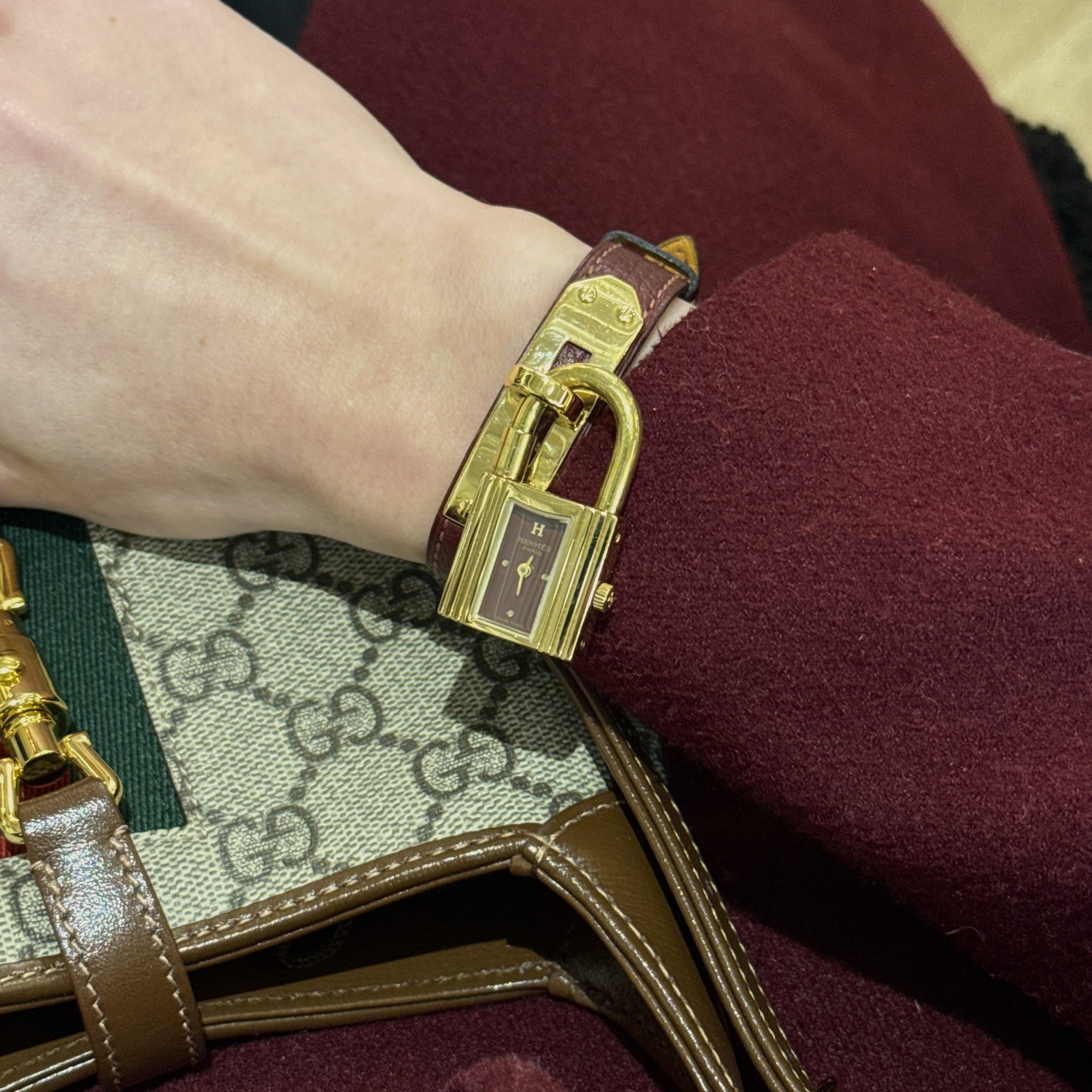 HERMÈS Kelly gold-plated watch