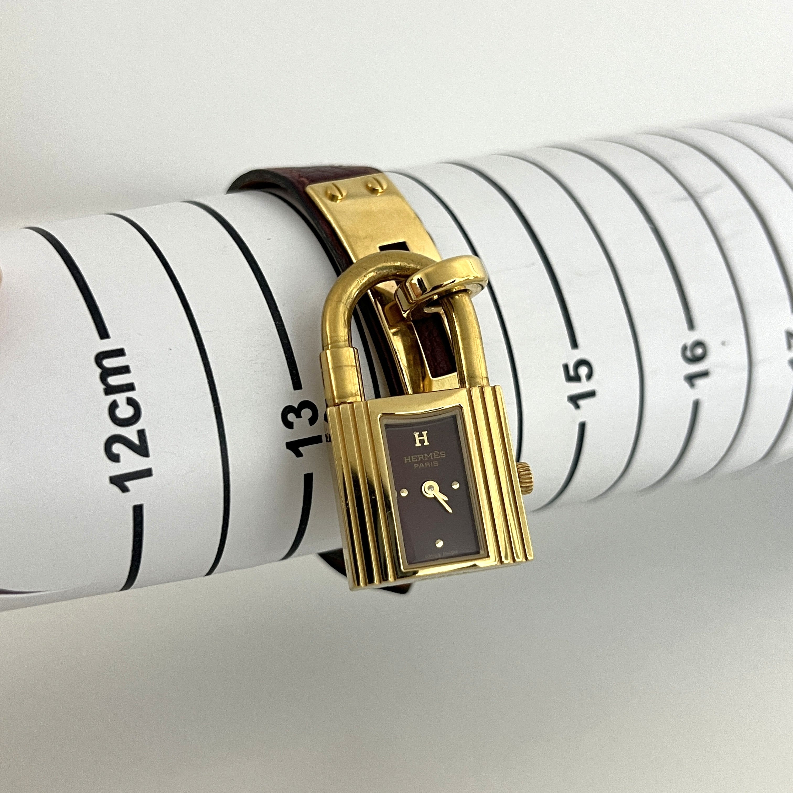 Montre HERMÈS Kelly plaquée or dorée