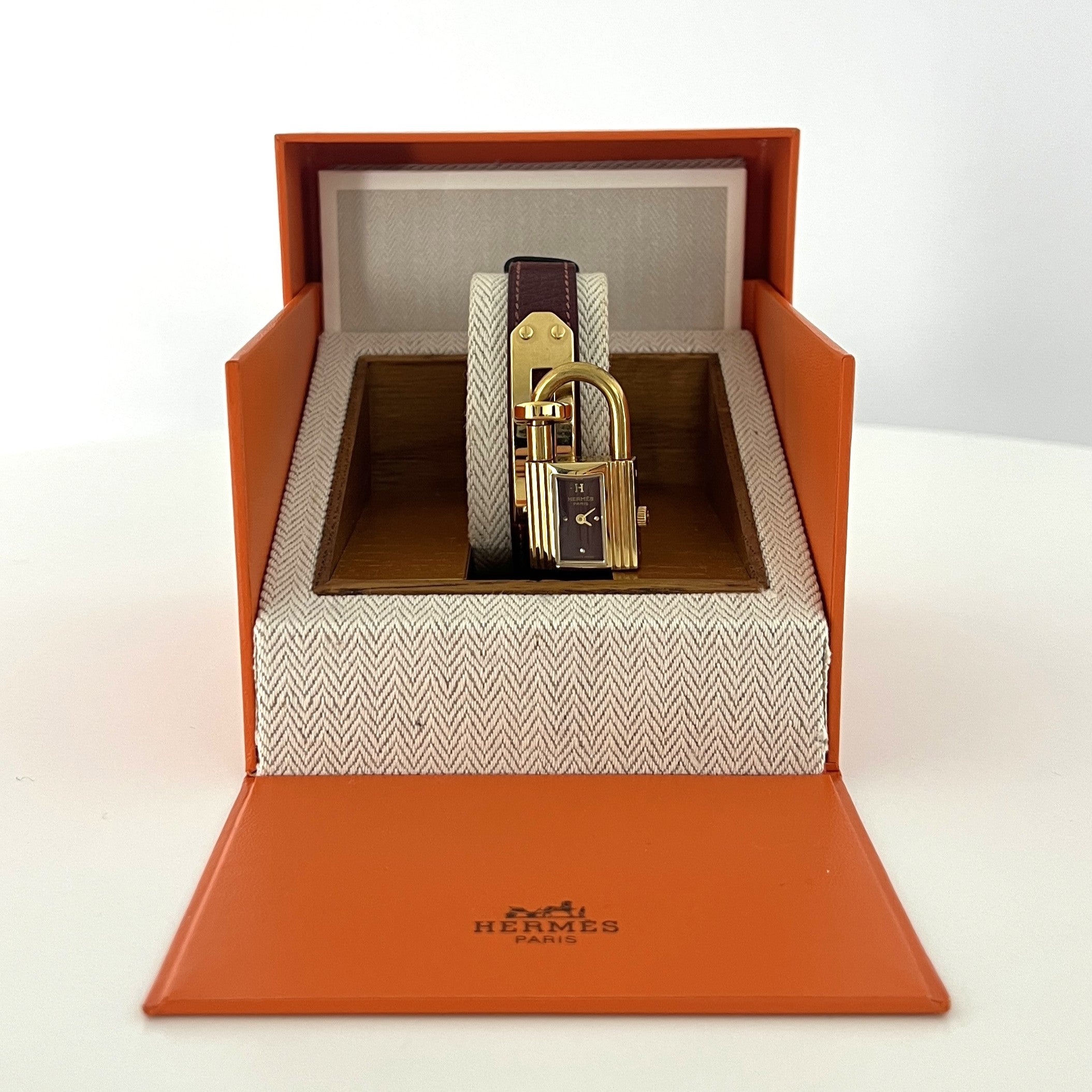 HERMÈS Kelly gold-plated watch