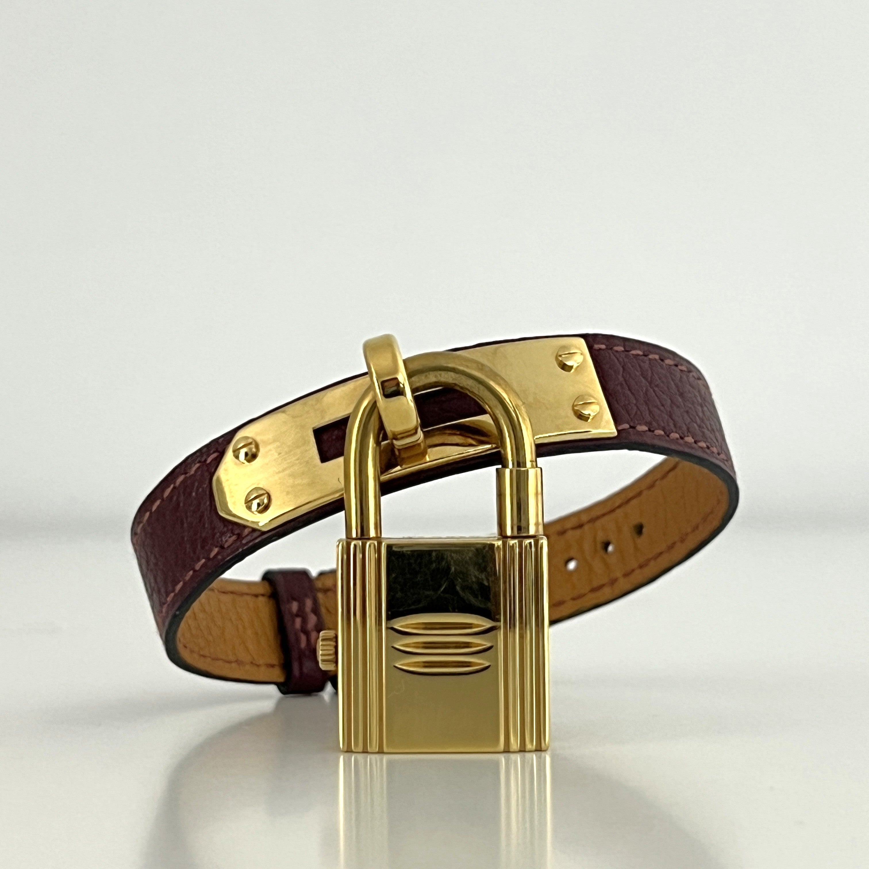 HERMÈS Kelly gold-plated watch