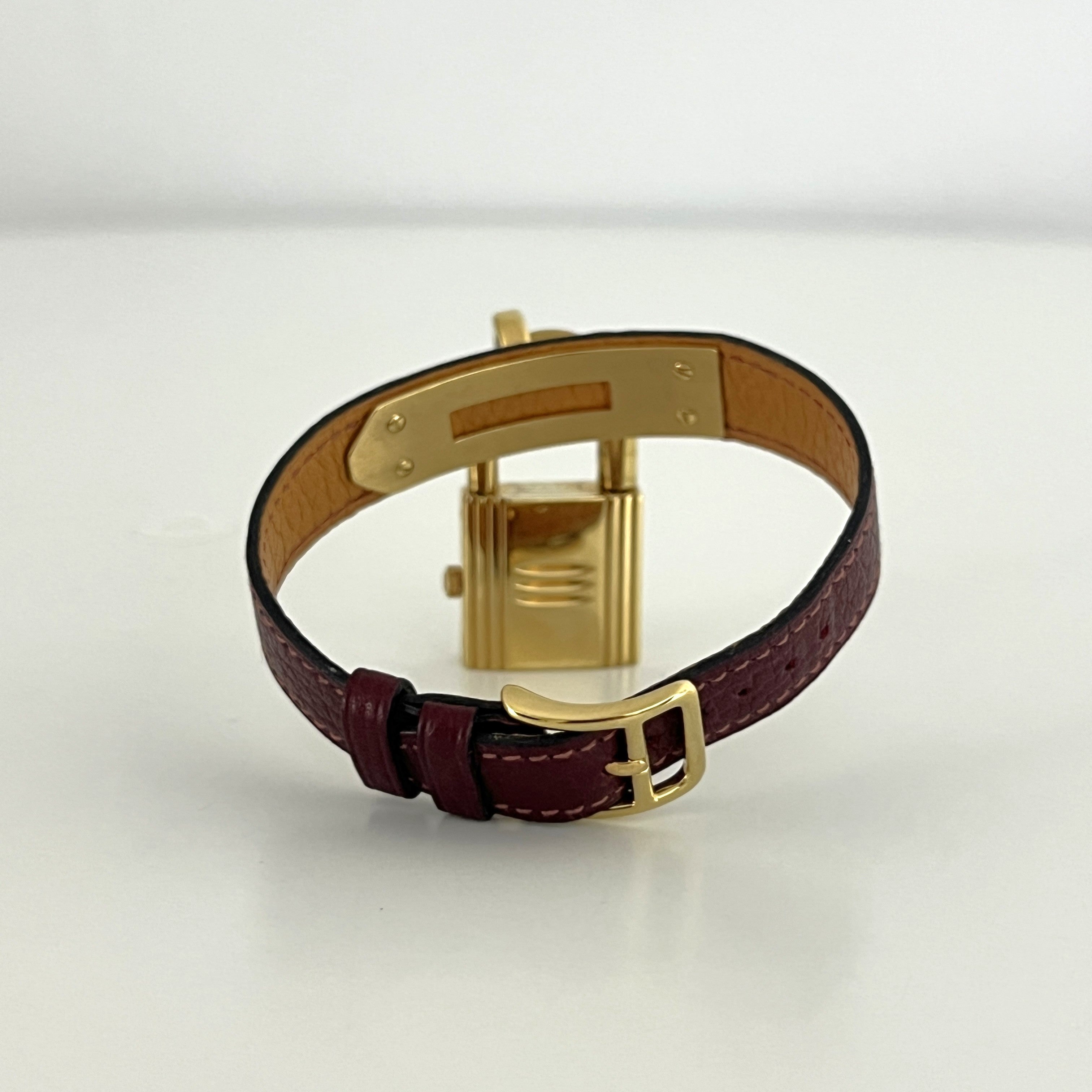 HERMÈS Kelly gold-plated watch