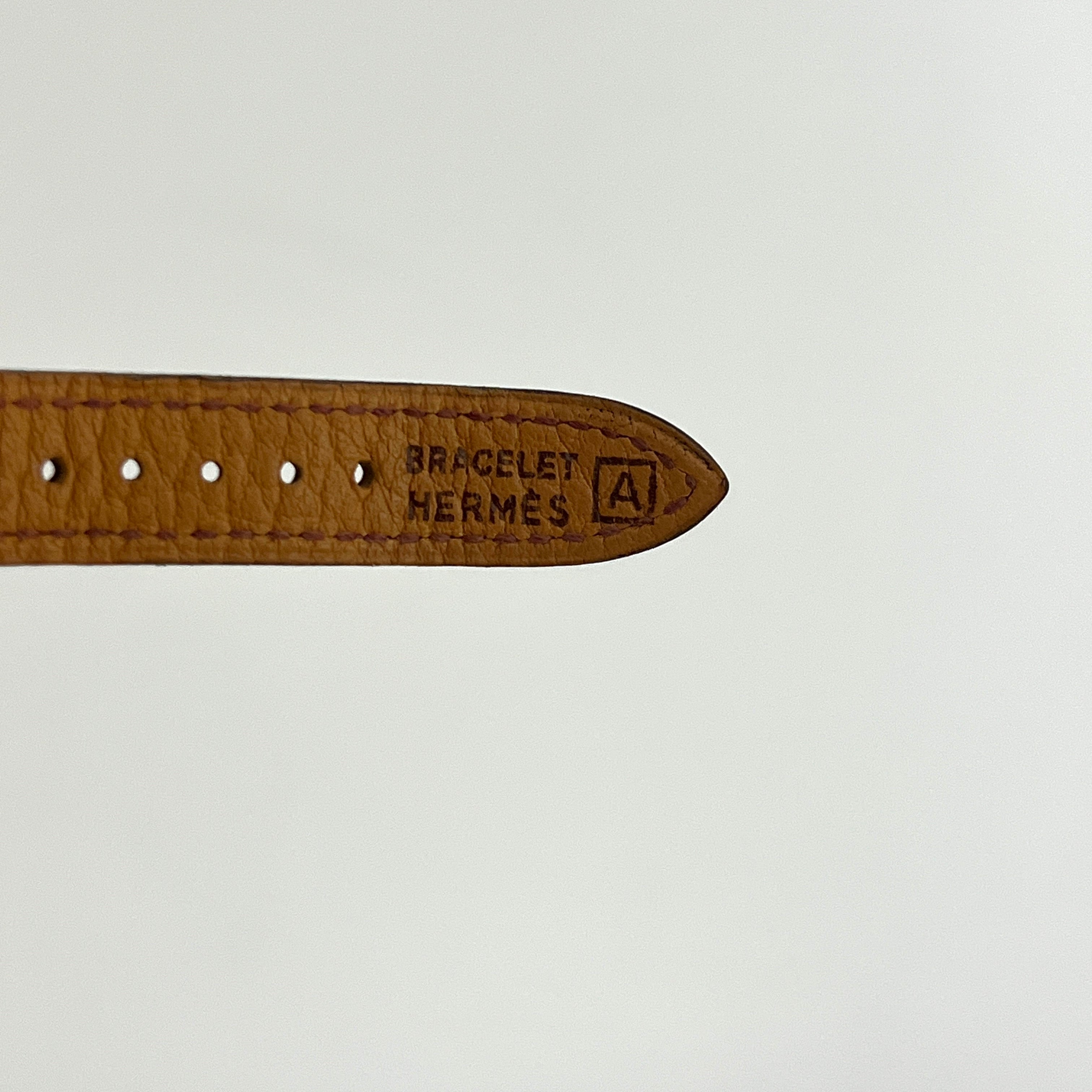 HERMÈS Kelly gold-plated watch