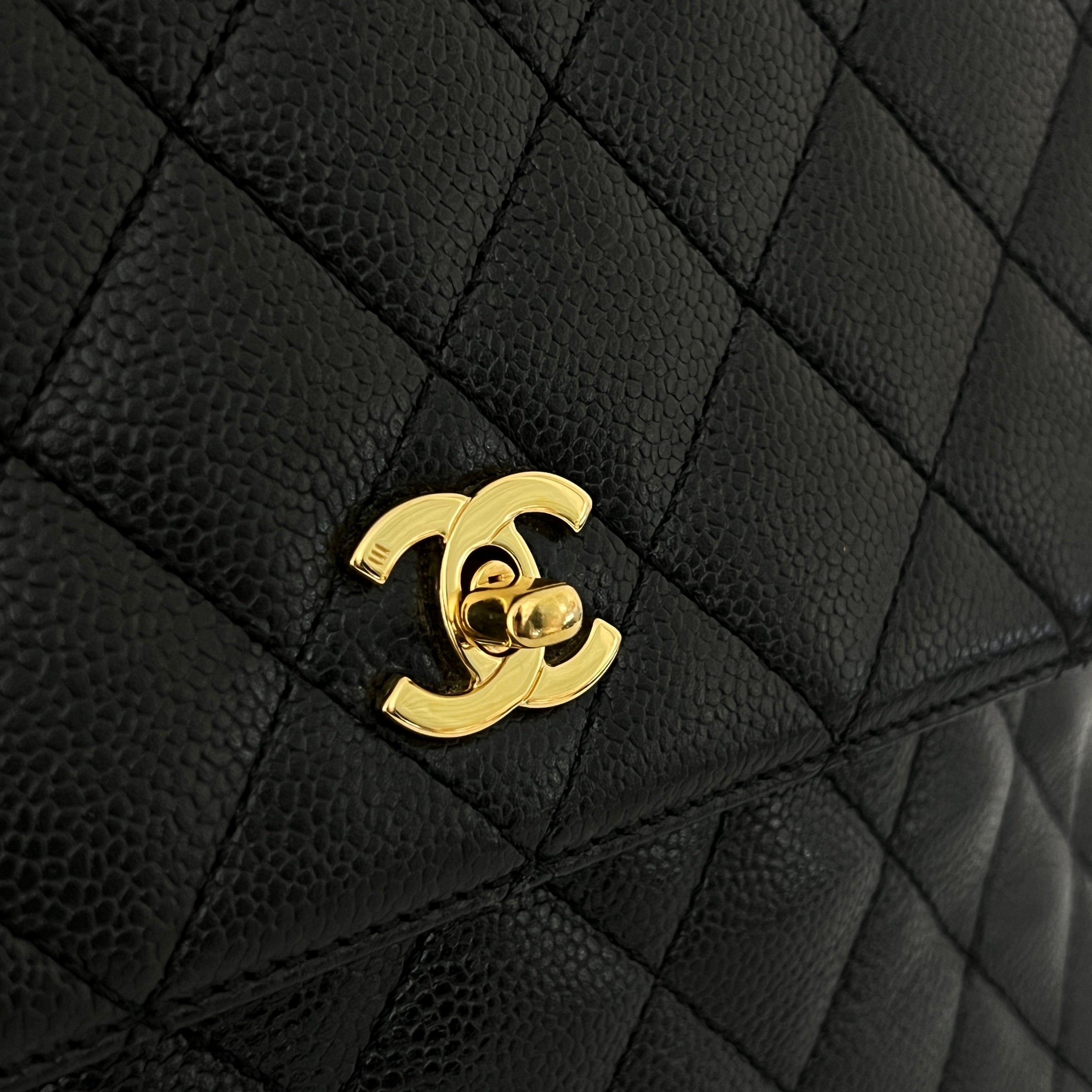 Sac à main CHANEL Top Handle cuir caviar noir