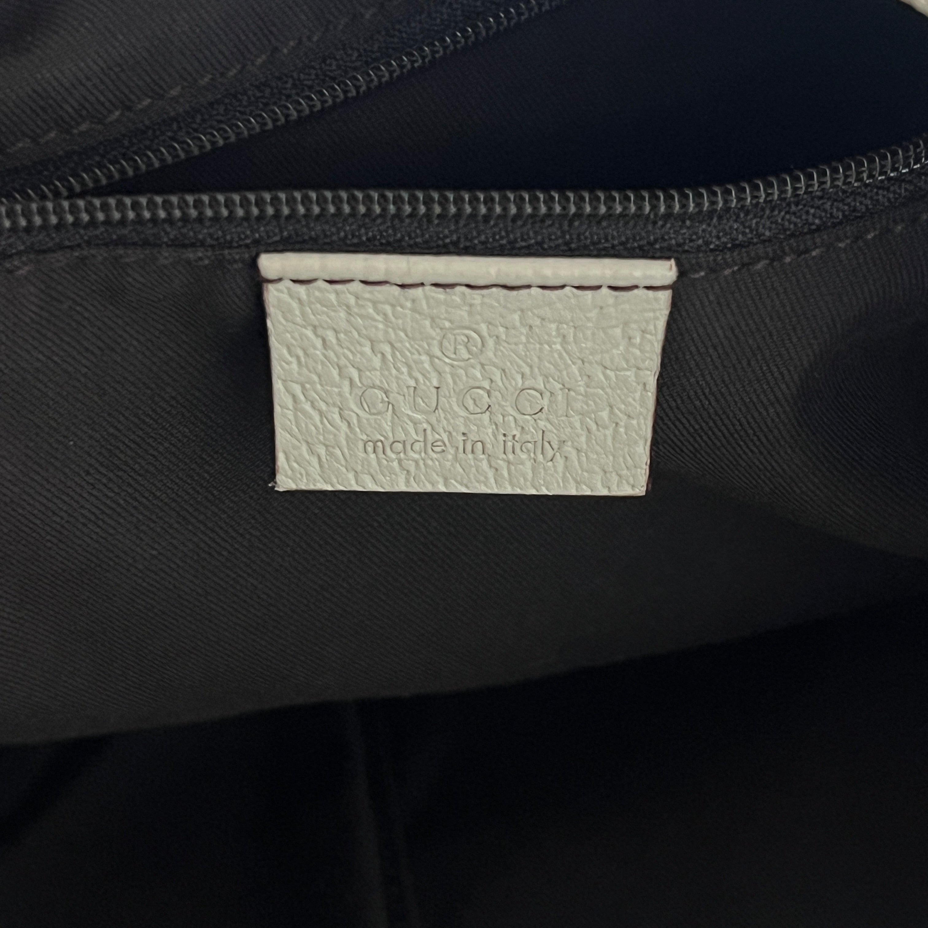 GUCCI Abbey GG canvas and brown leather bag