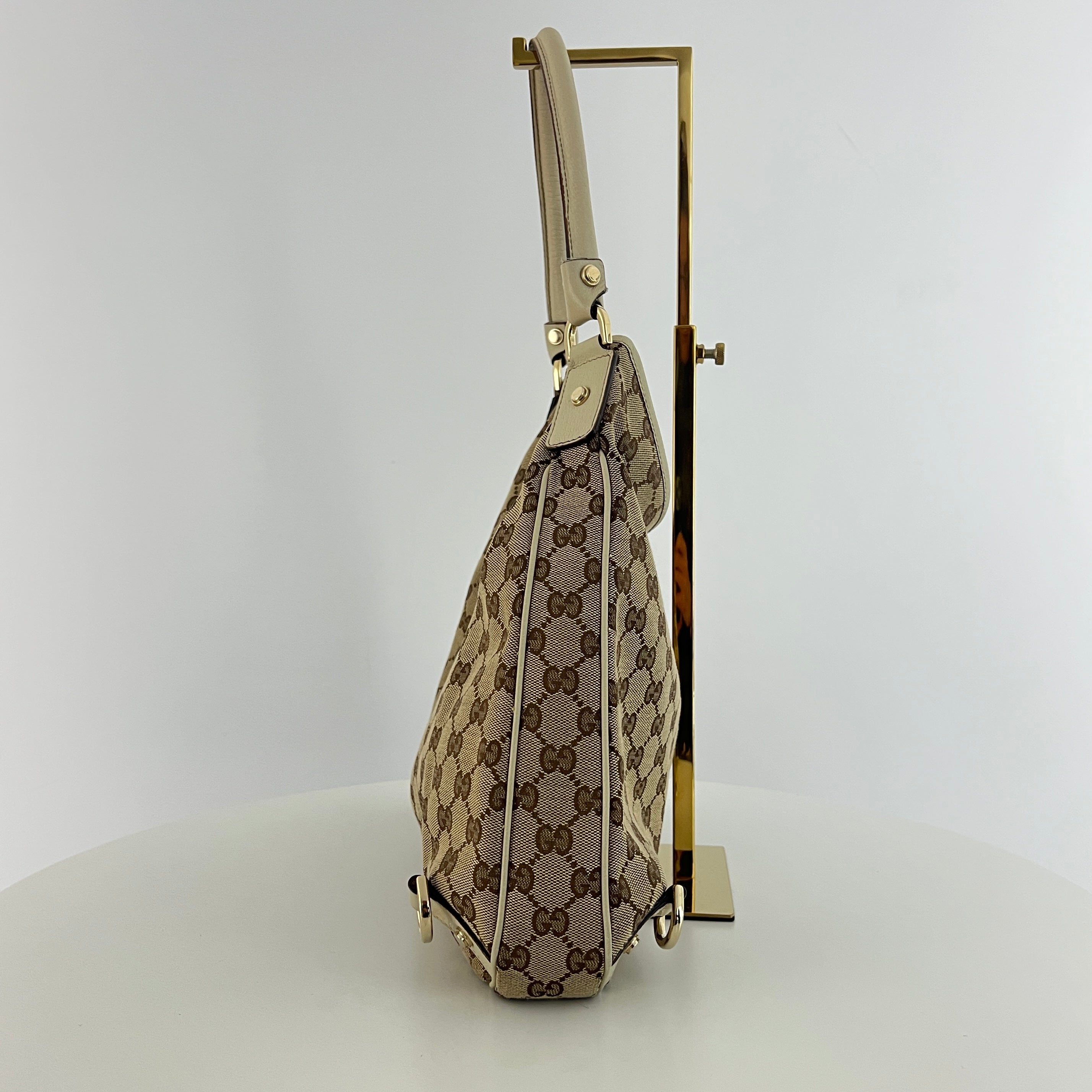 GUCCI Abbey GG canvas and brown leather bag