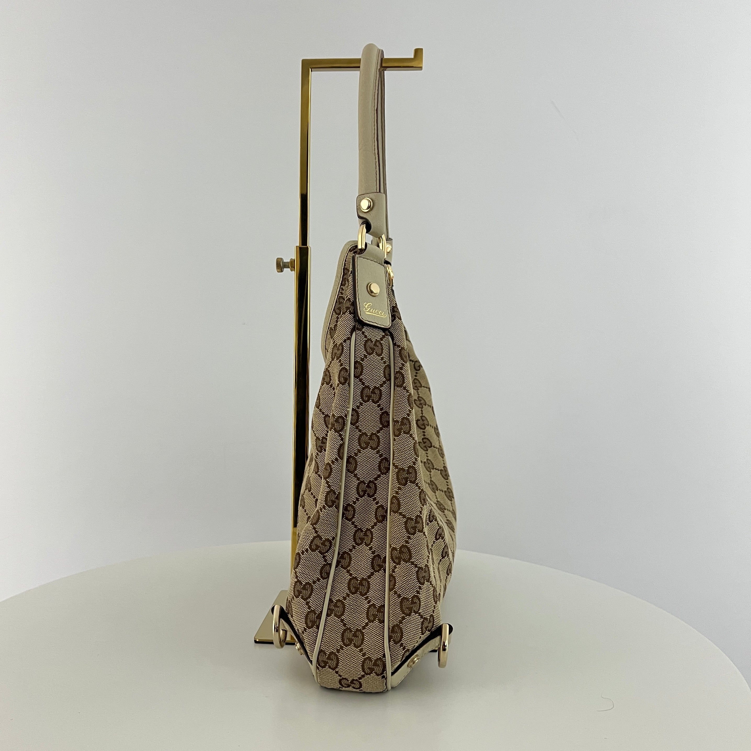 GUCCI Abbey GG canvas and brown leather bag