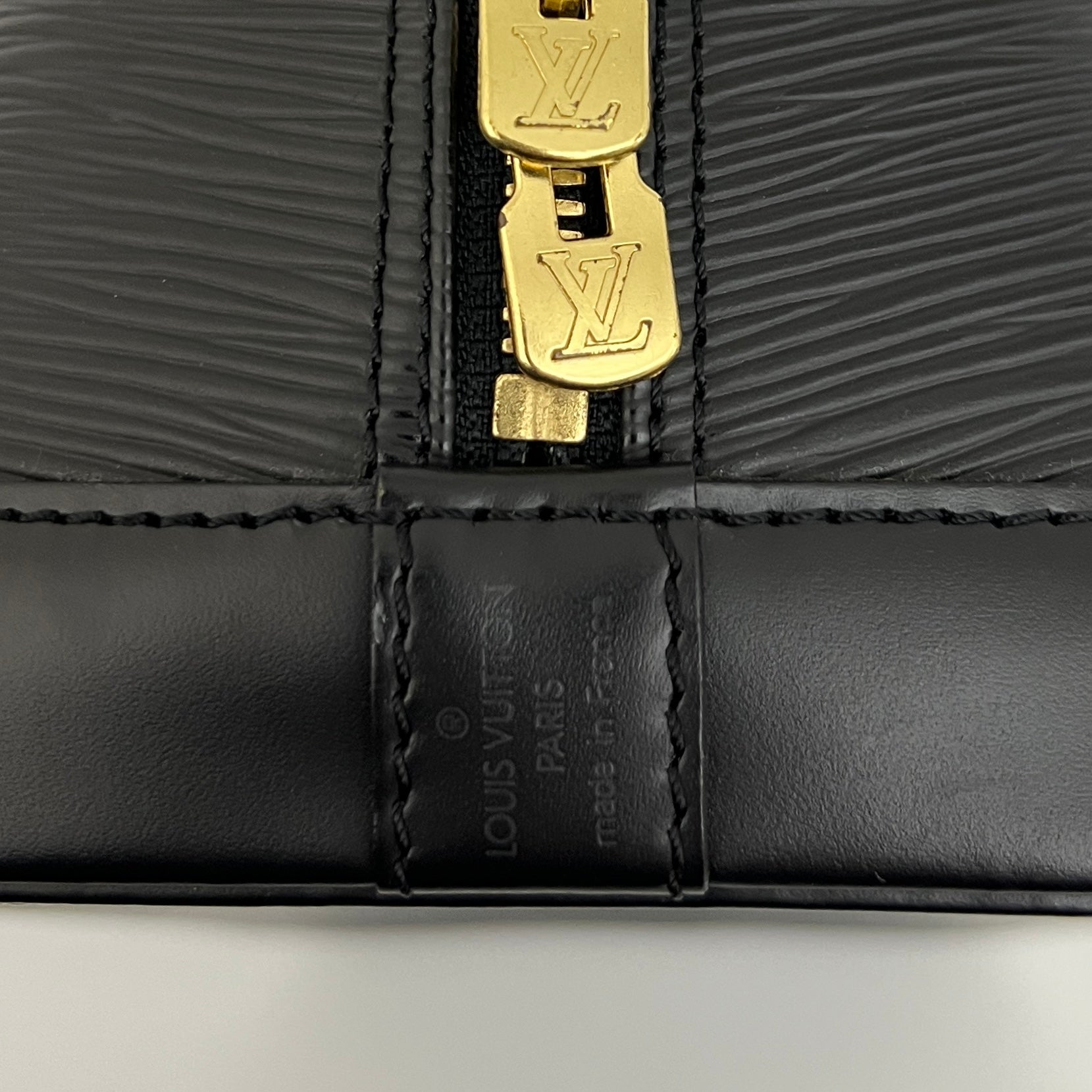 LOUIS VUITTON Alma PM handbag in black Epi leather