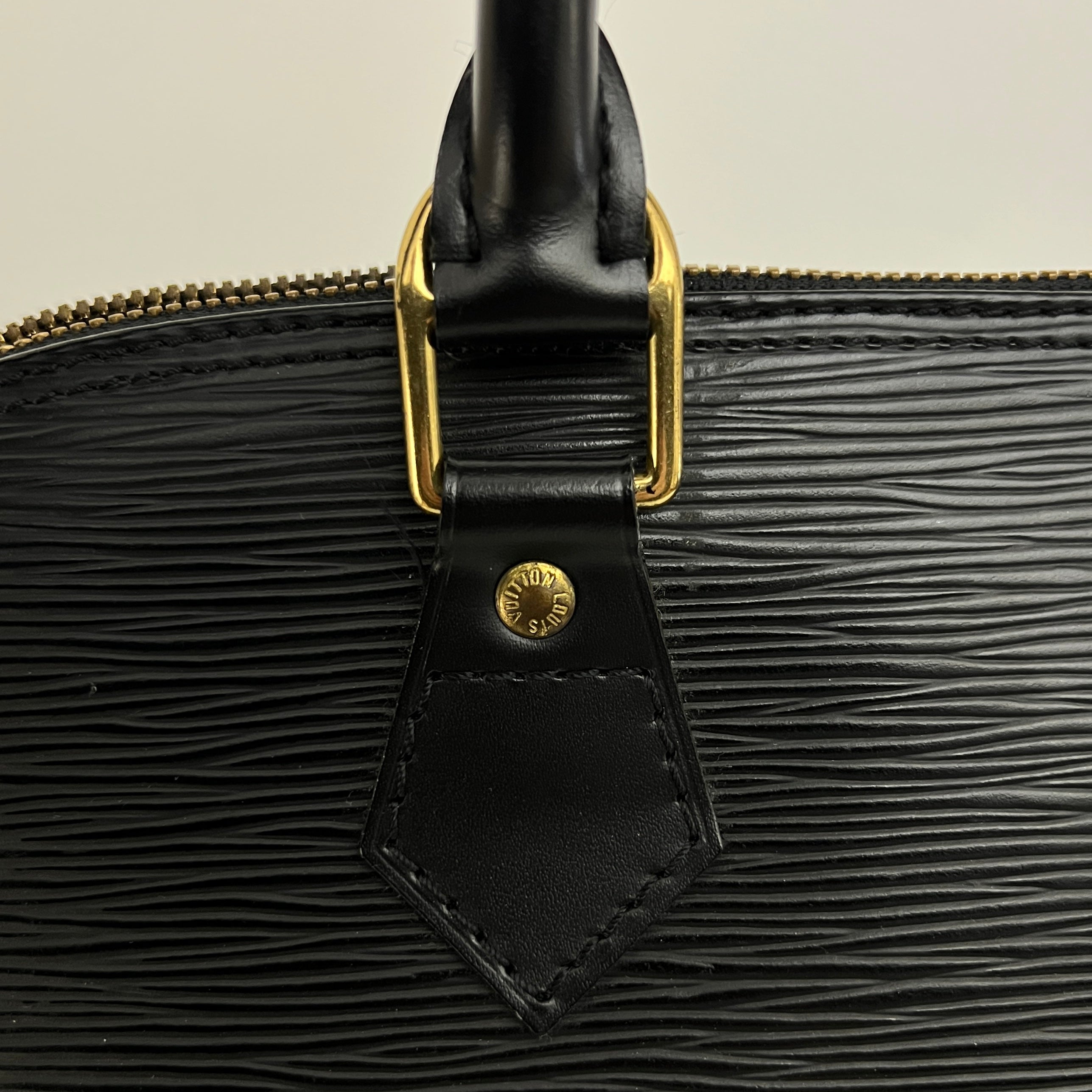 LOUIS VUITTON Alma PM handbag in black Epi leather