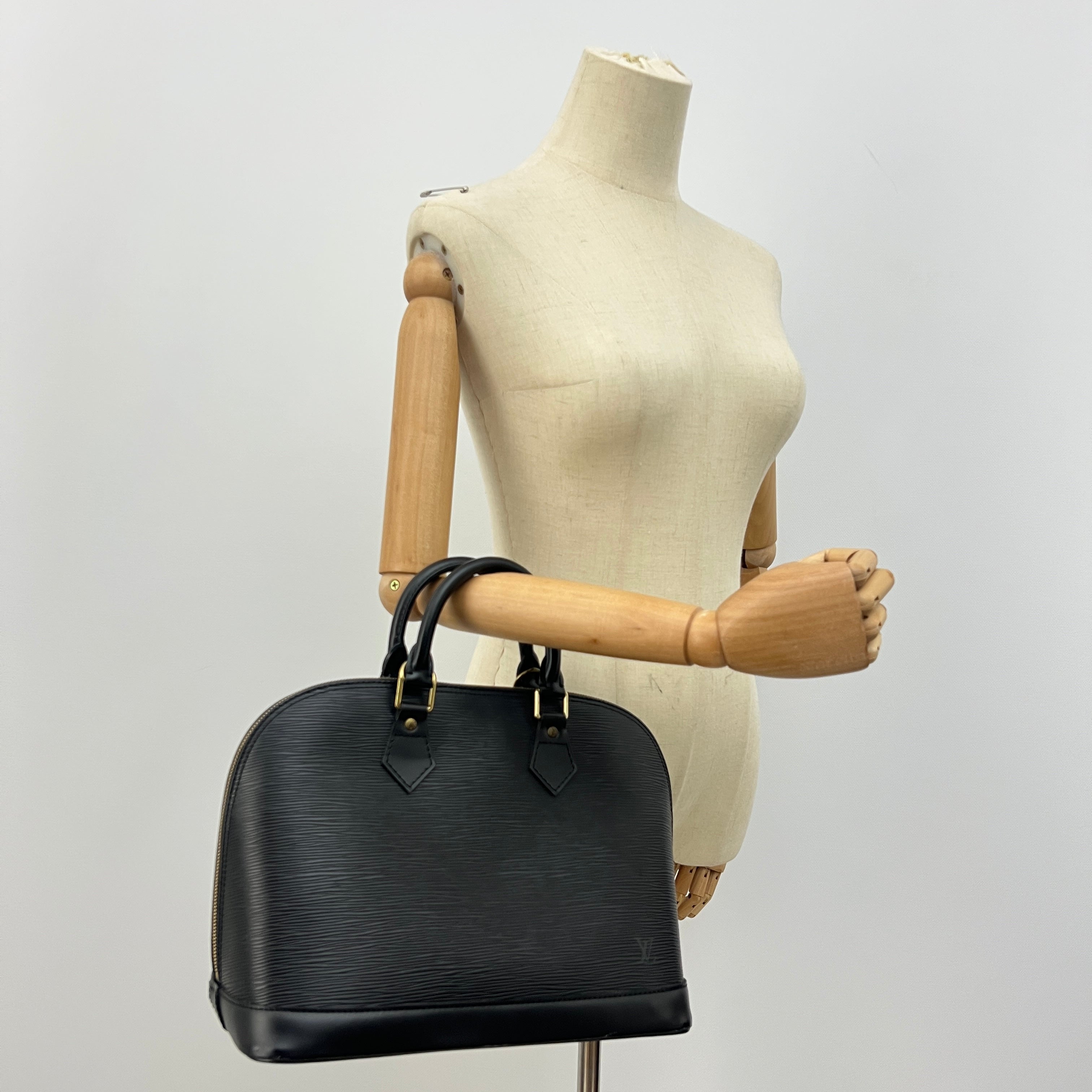 LOUIS VUITTON Alma PM handbag in black Epi leather