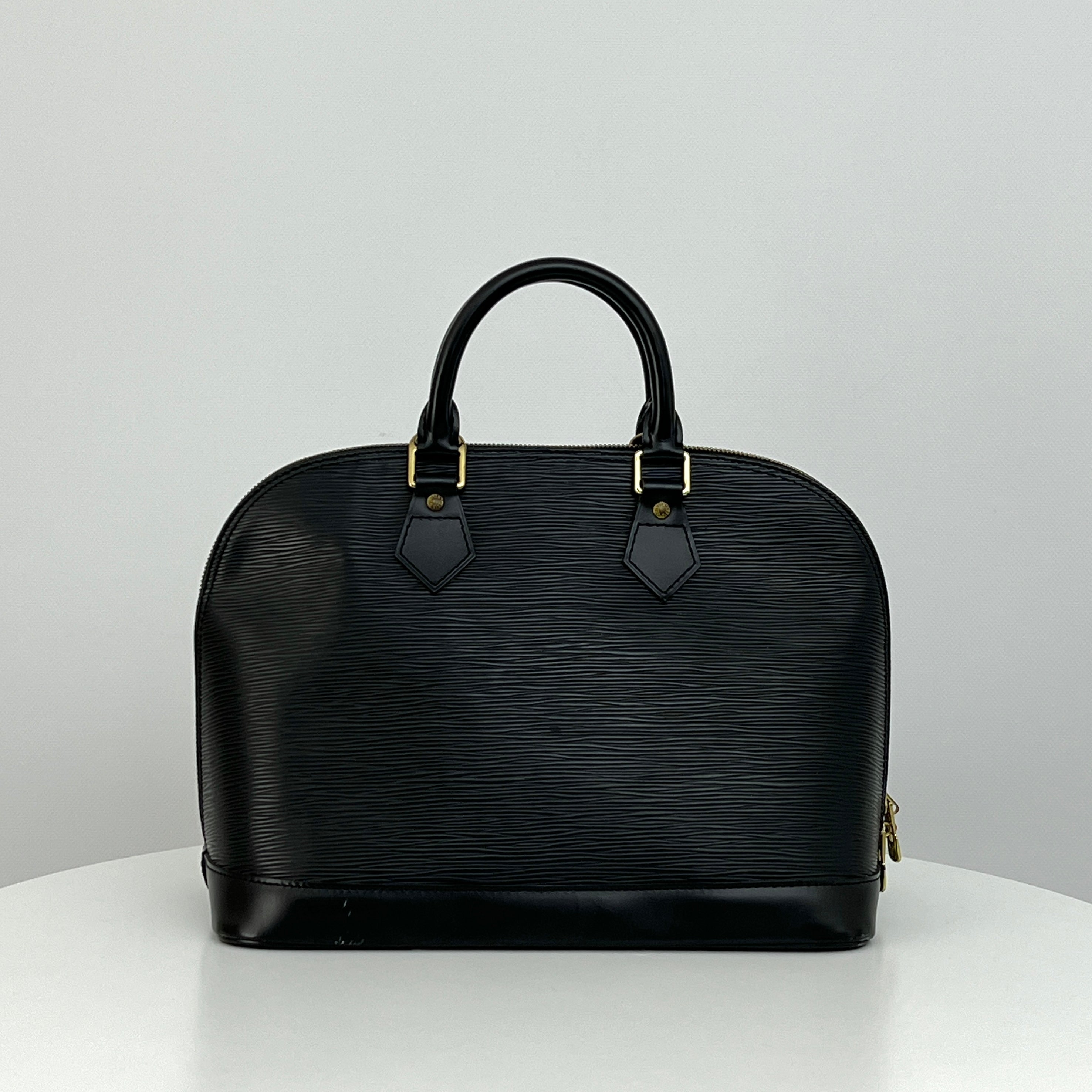 LOUIS VUITTON Alma PM handbag in black Epi leather