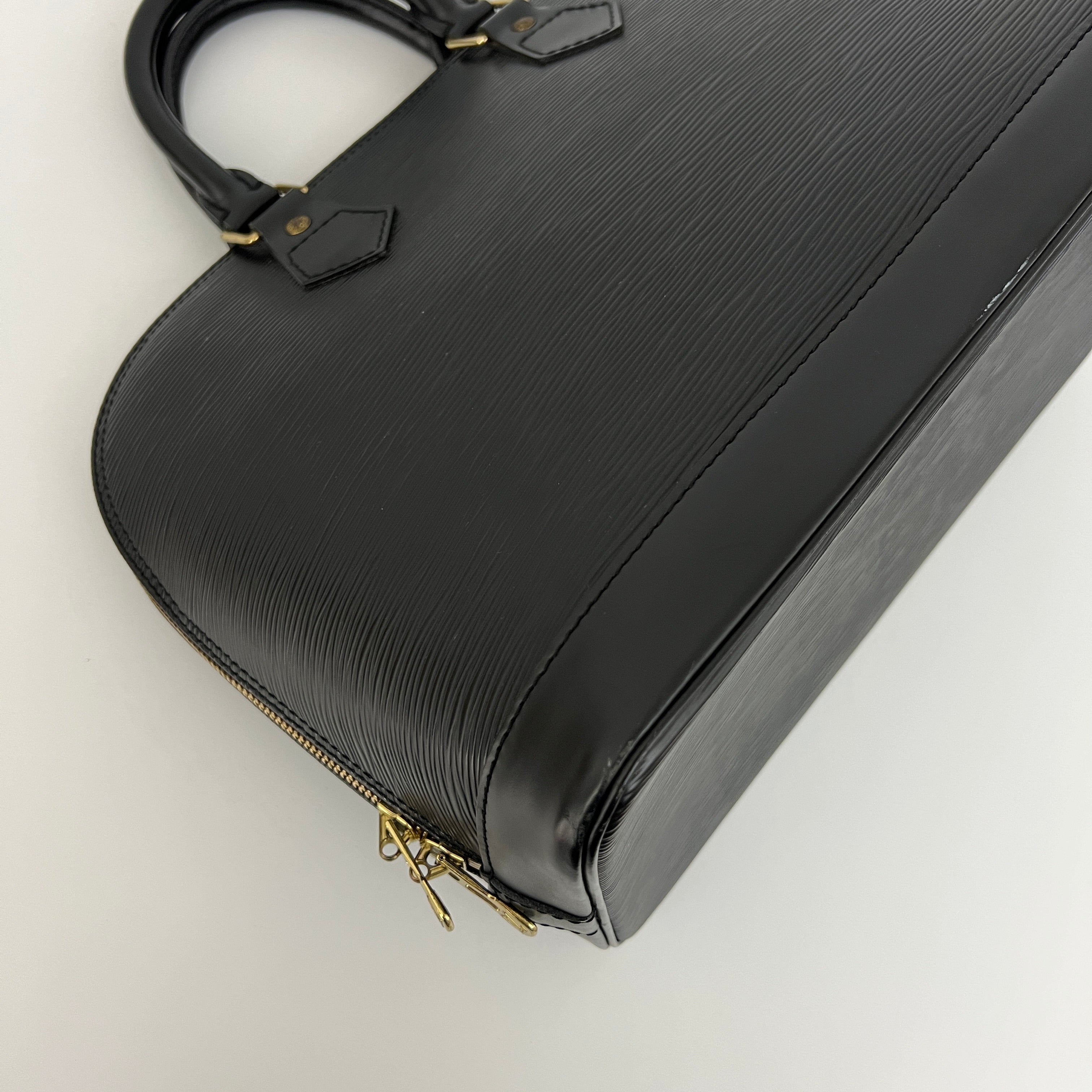 LOUIS VUITTON Alma PM handbag in black Epi leather