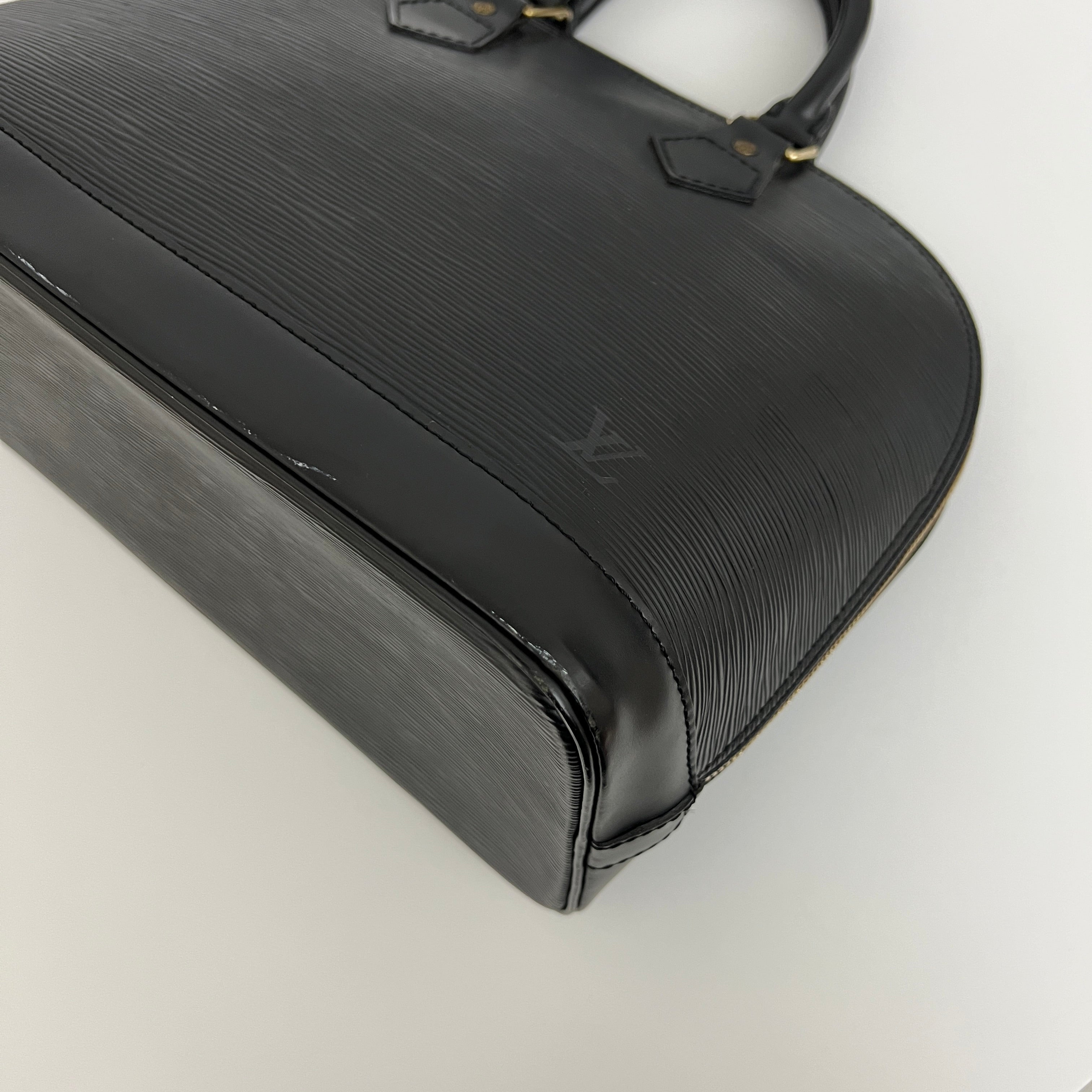 LOUIS VUITTON Alma PM handbag in black Epi leather