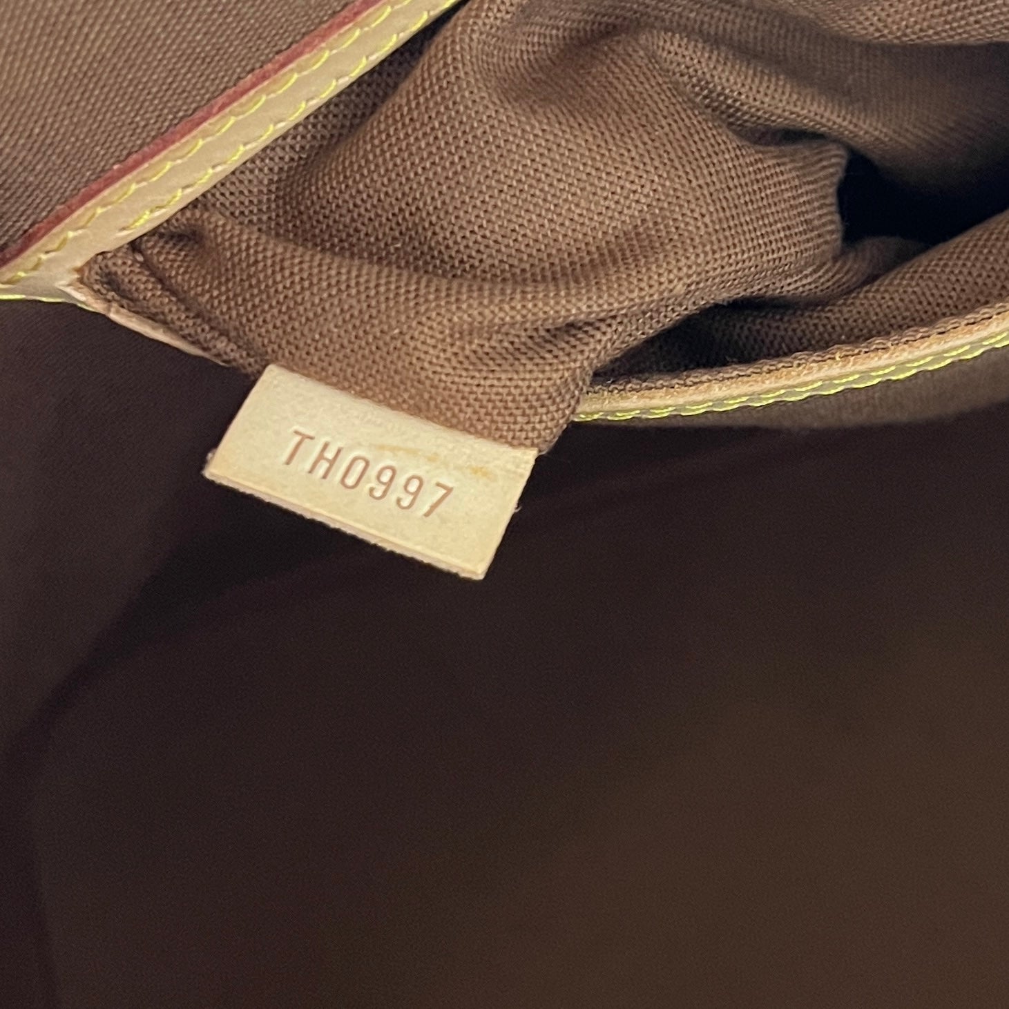 LOUIS VUITTON Alma PM handbag in brown canvas and leather