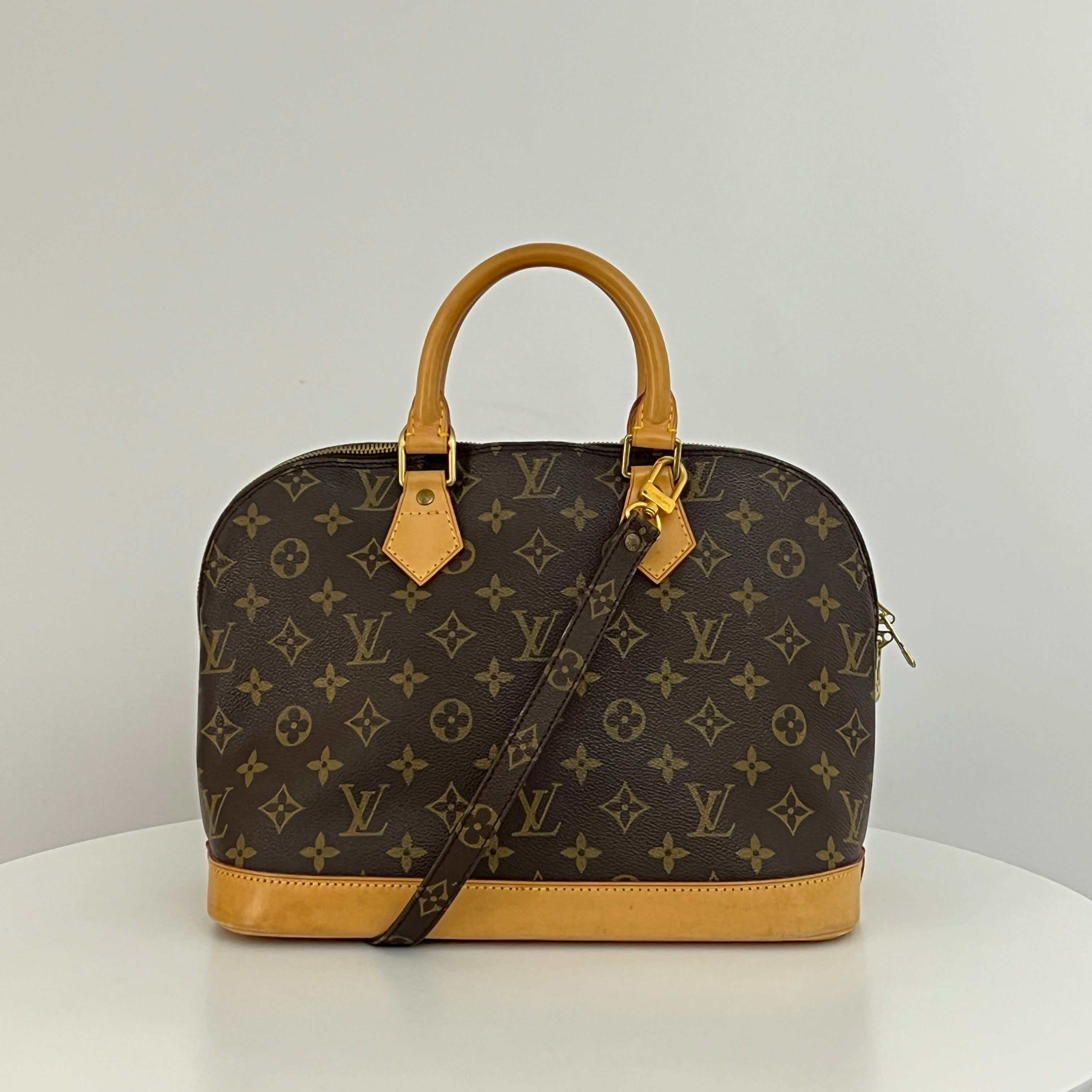 LOUIS VUITTON Alma PM handbag in brown canvas and leather