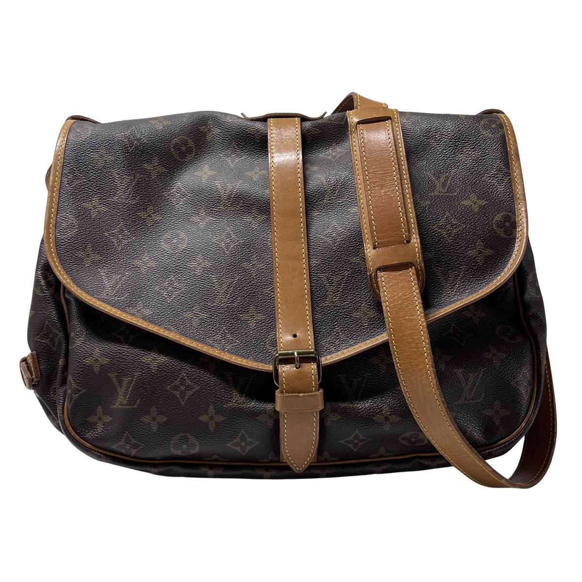 Sac à main LOUIS VUITTON Saumur 35 toile et cuir marron