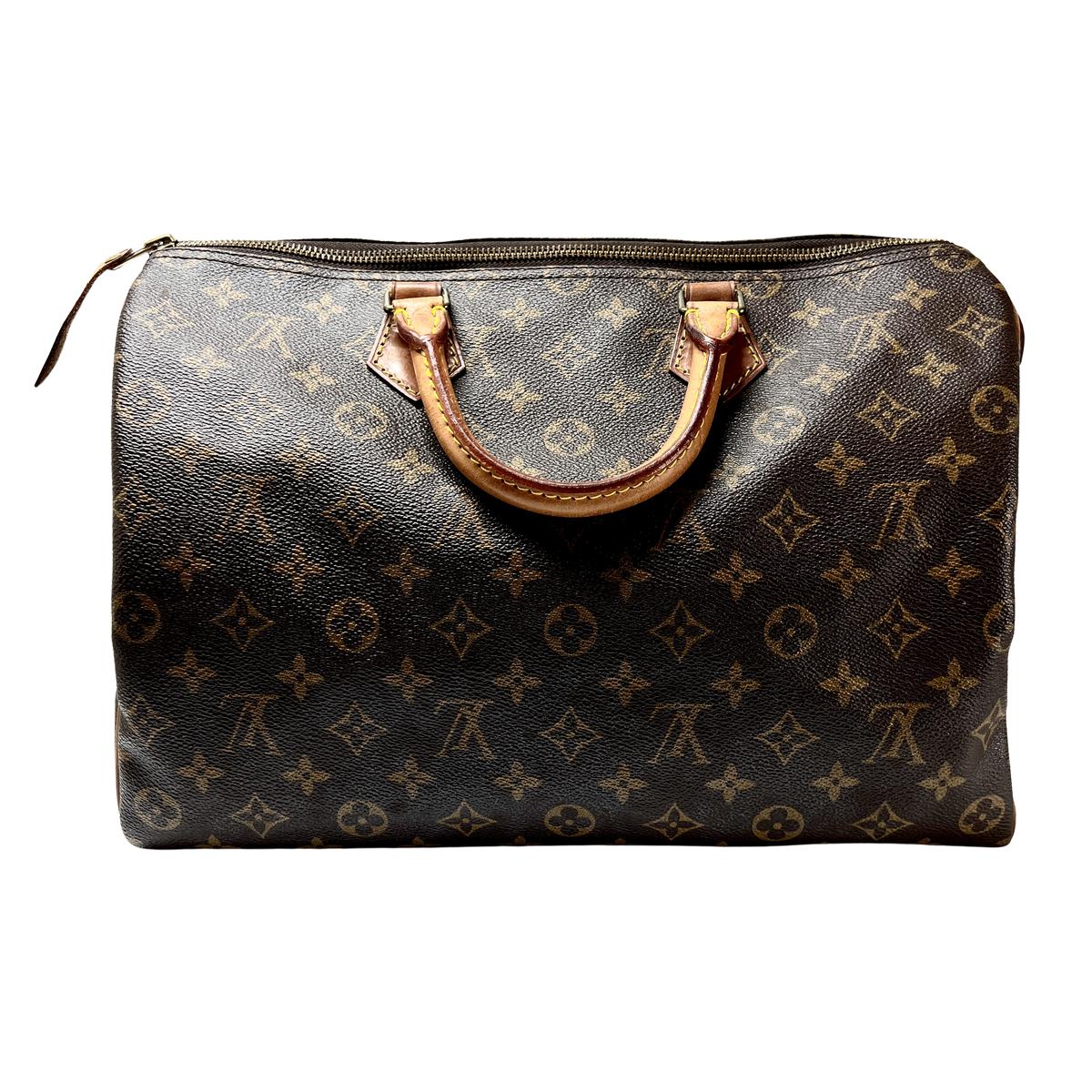 LOUIS VUITTON Speedy handbag in brown canvas and leather