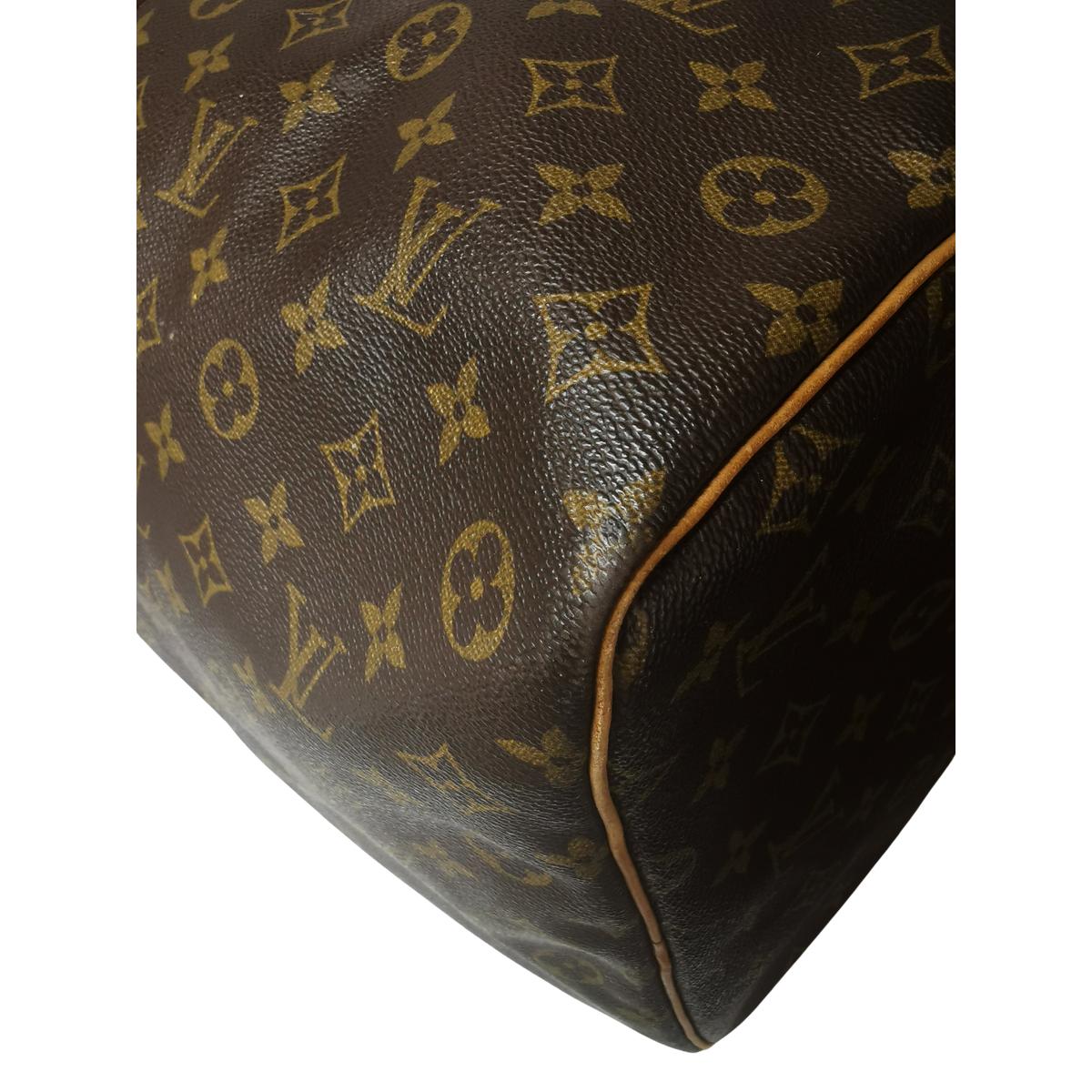 LOUIS VUITTON Keepall 60 canvas and leather travel bag Brown S082427