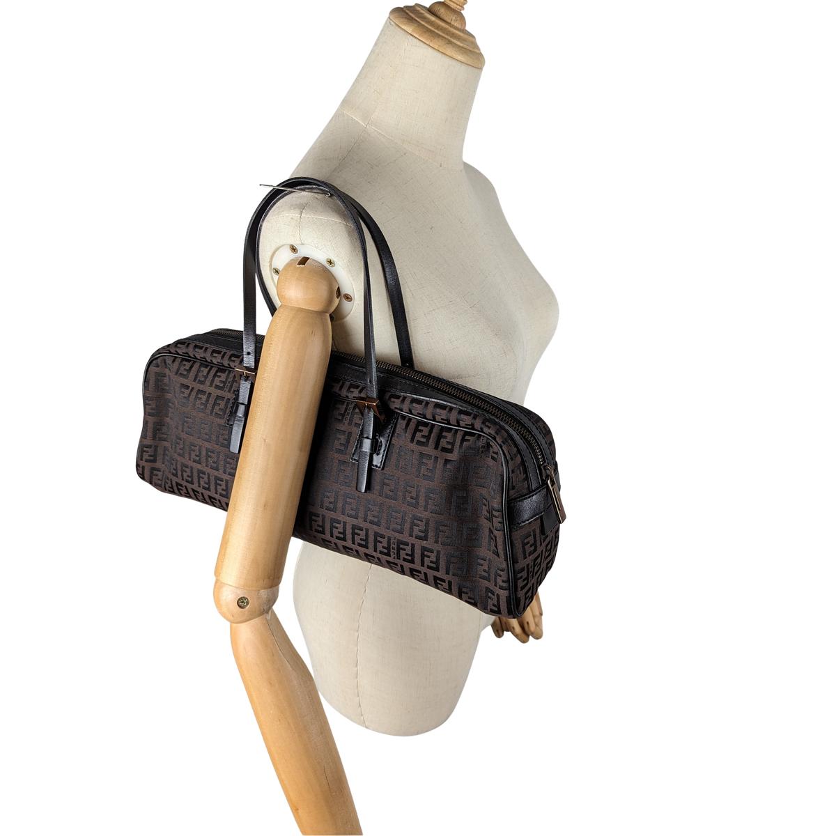 FENDI Baguette canvas and leather handbag Brown