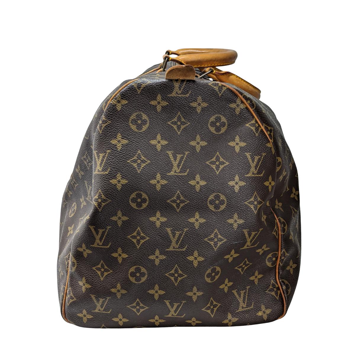 LOUIS VUITTON Keepall 55 canvas and leather travel bag Brown S072425