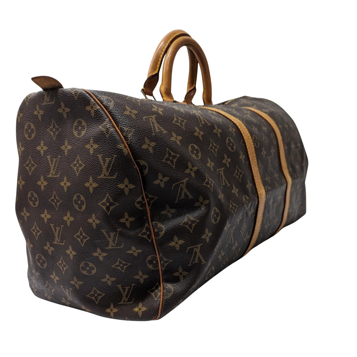 LOUIS VUITTON Keepall 55 canvas and leather travel bag Brown S072425