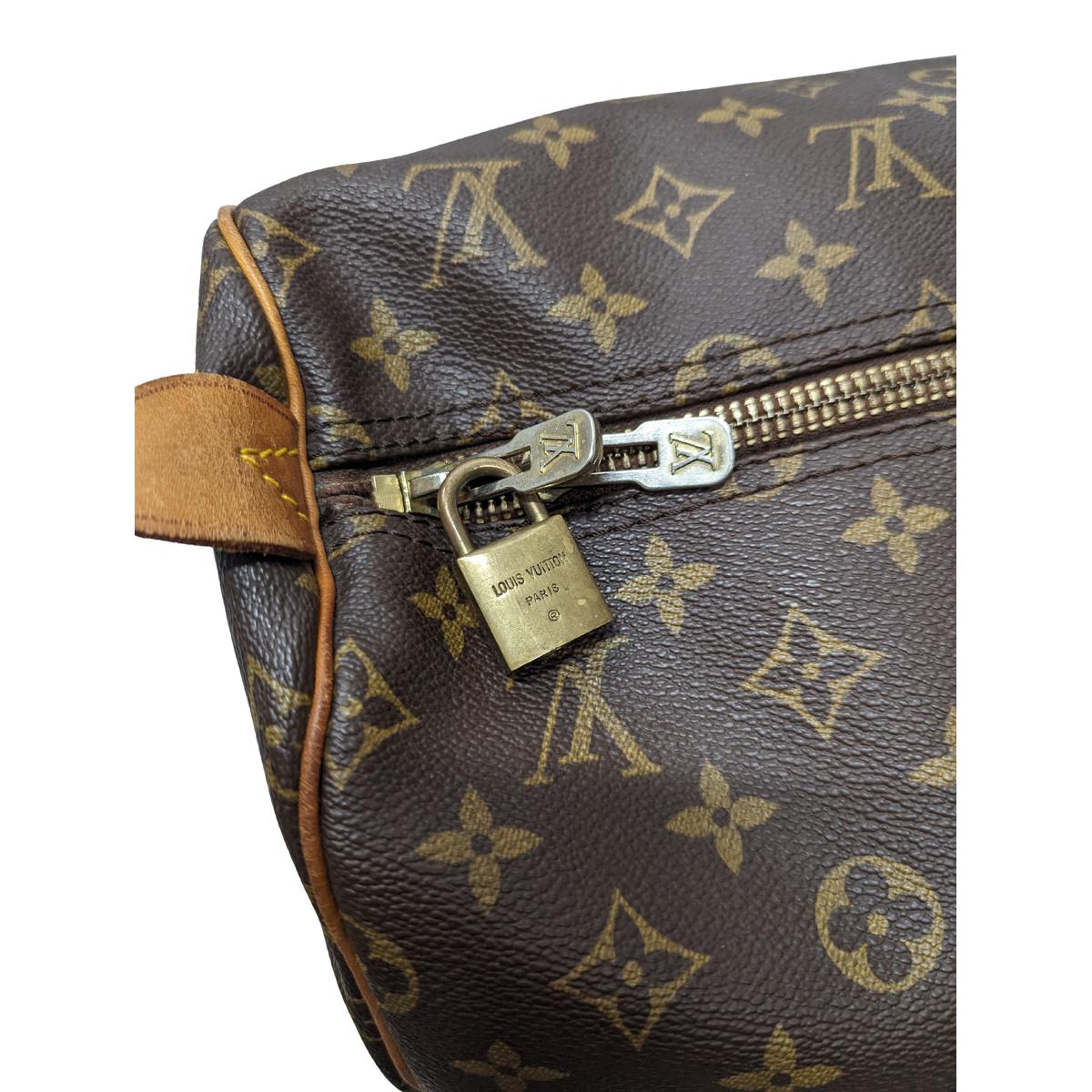 LOUIS VUITTON Keepall 55 canvas and leather travel bag Brown S072425