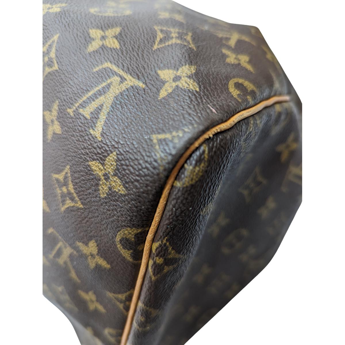 LOUIS VUITTON Keepall 55 canvas and leather travel bag Brown S072425