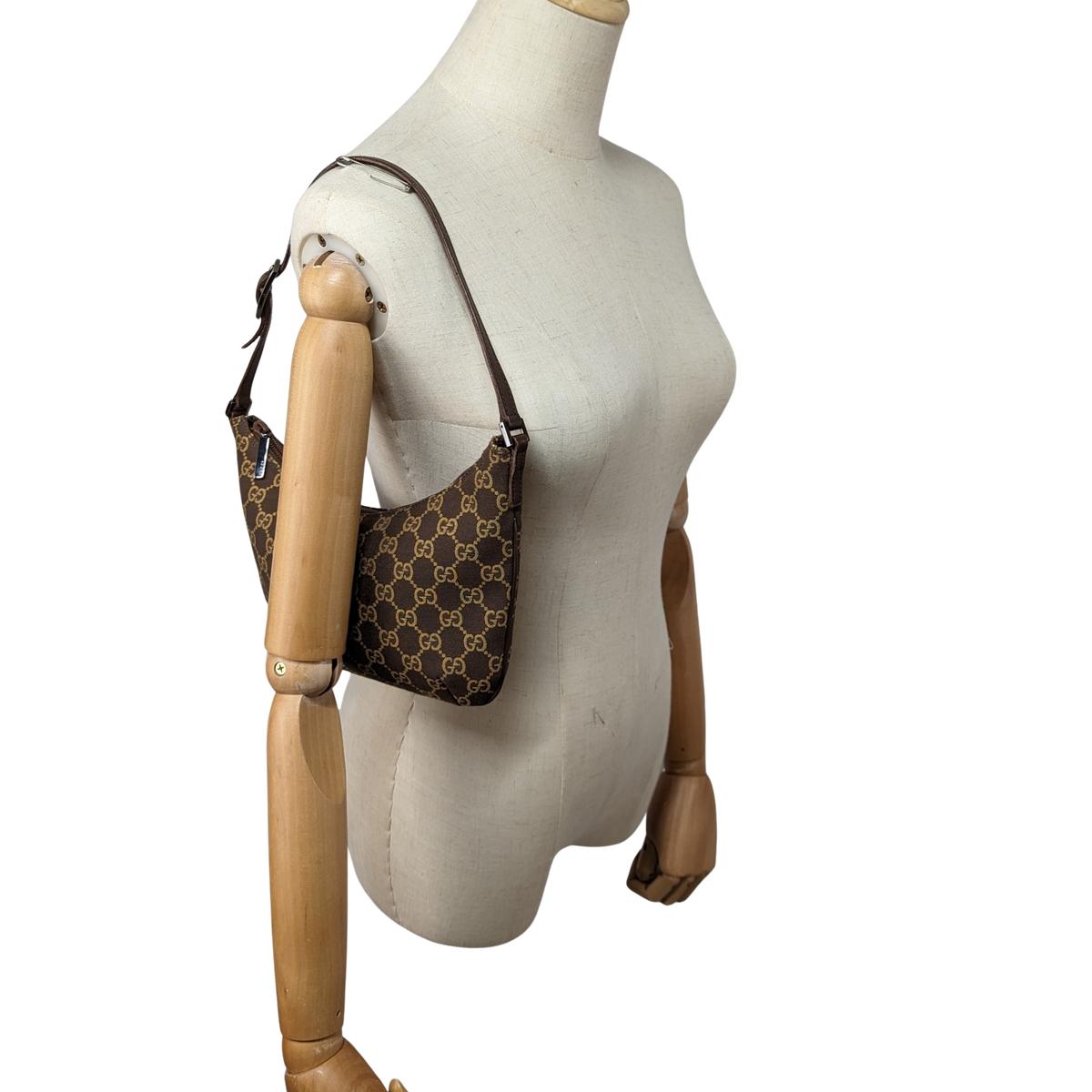 GUCCI Hobo accessory pouch canvas and leather Brown handbag