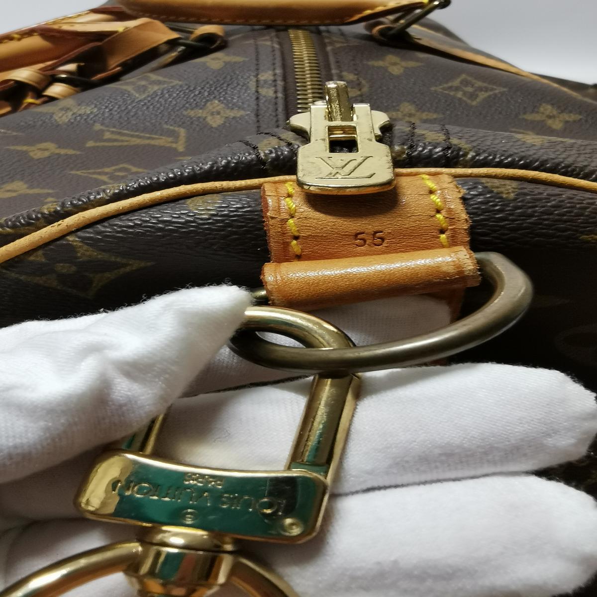 LOUIS VUITTON Keepall 55 canvas and leather travel bag Brown S082426