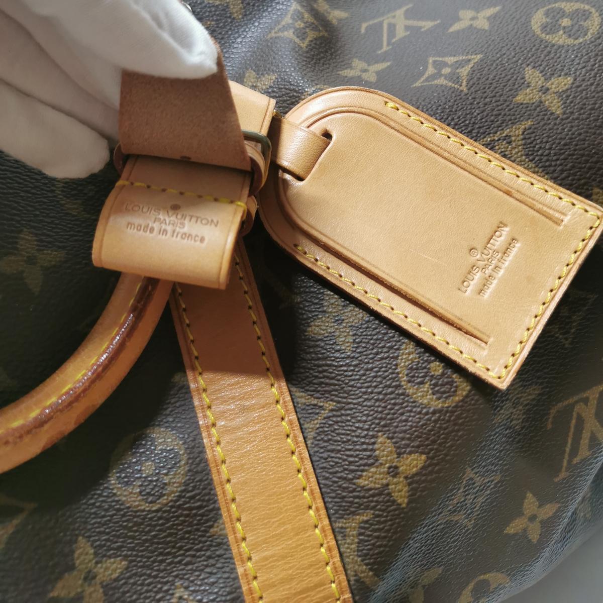 LOUIS VUITTON Keepall 55 canvas and leather travel bag Brown S082426