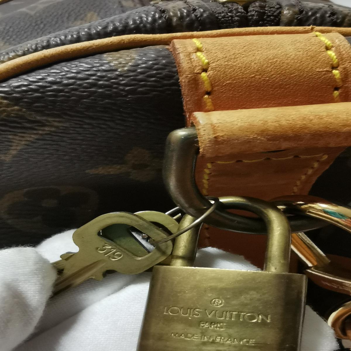 LOUIS VUITTON Keepall 55 canvas and leather travel bag Brown S082426